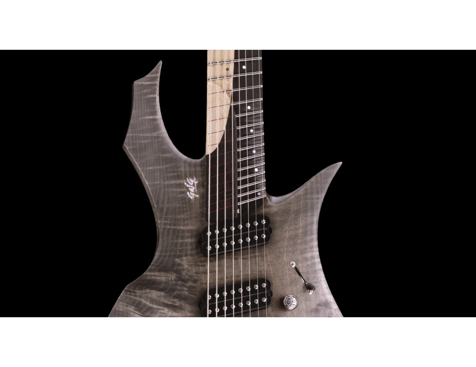 GNG - Giulio Negrini Guitar close-up of an electric with a distinctive angular body shape and a natural wood finish, set against a black background.
