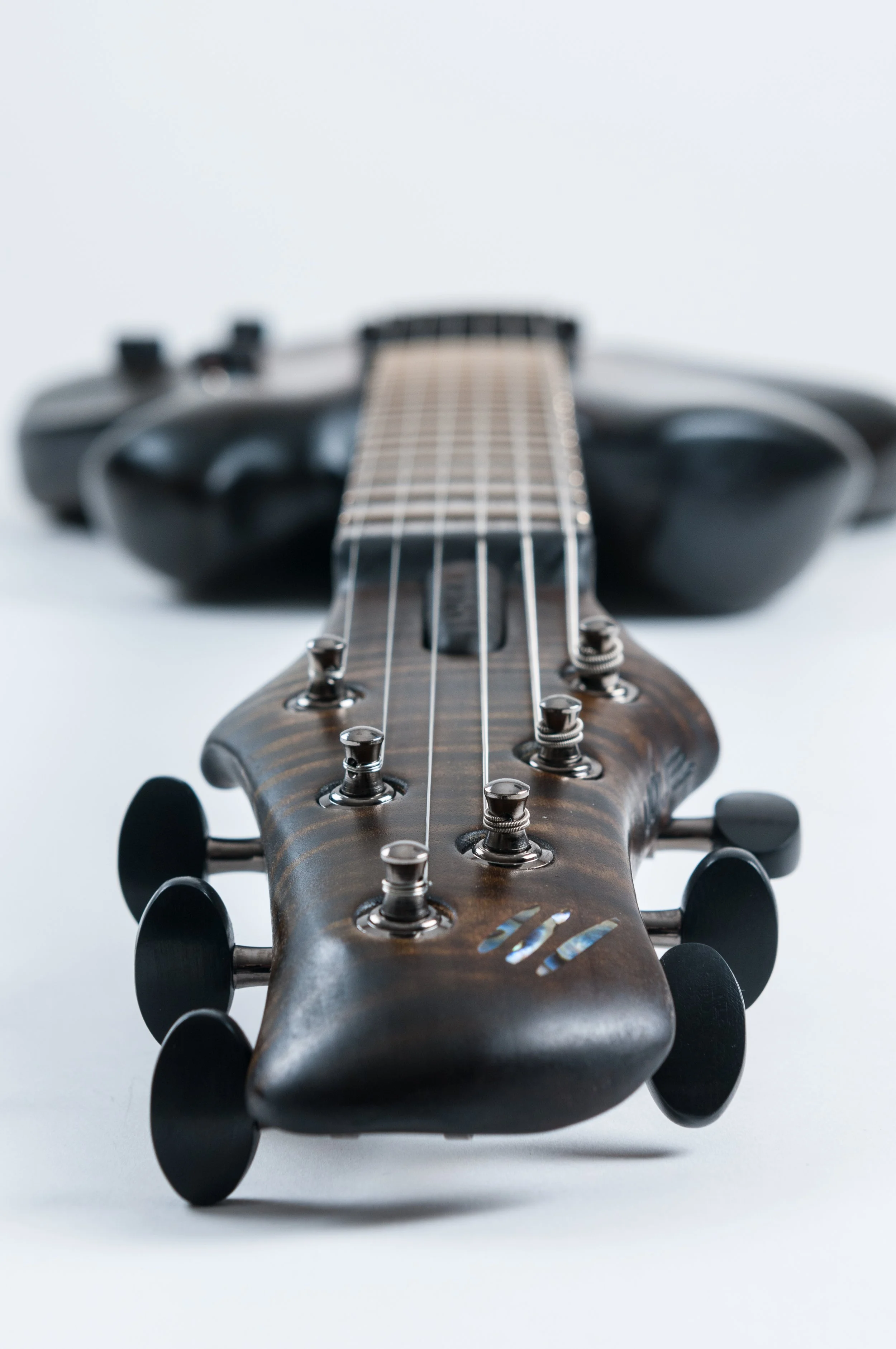 Close-up of the front of an Ergon Guitar shot from headstock down the body