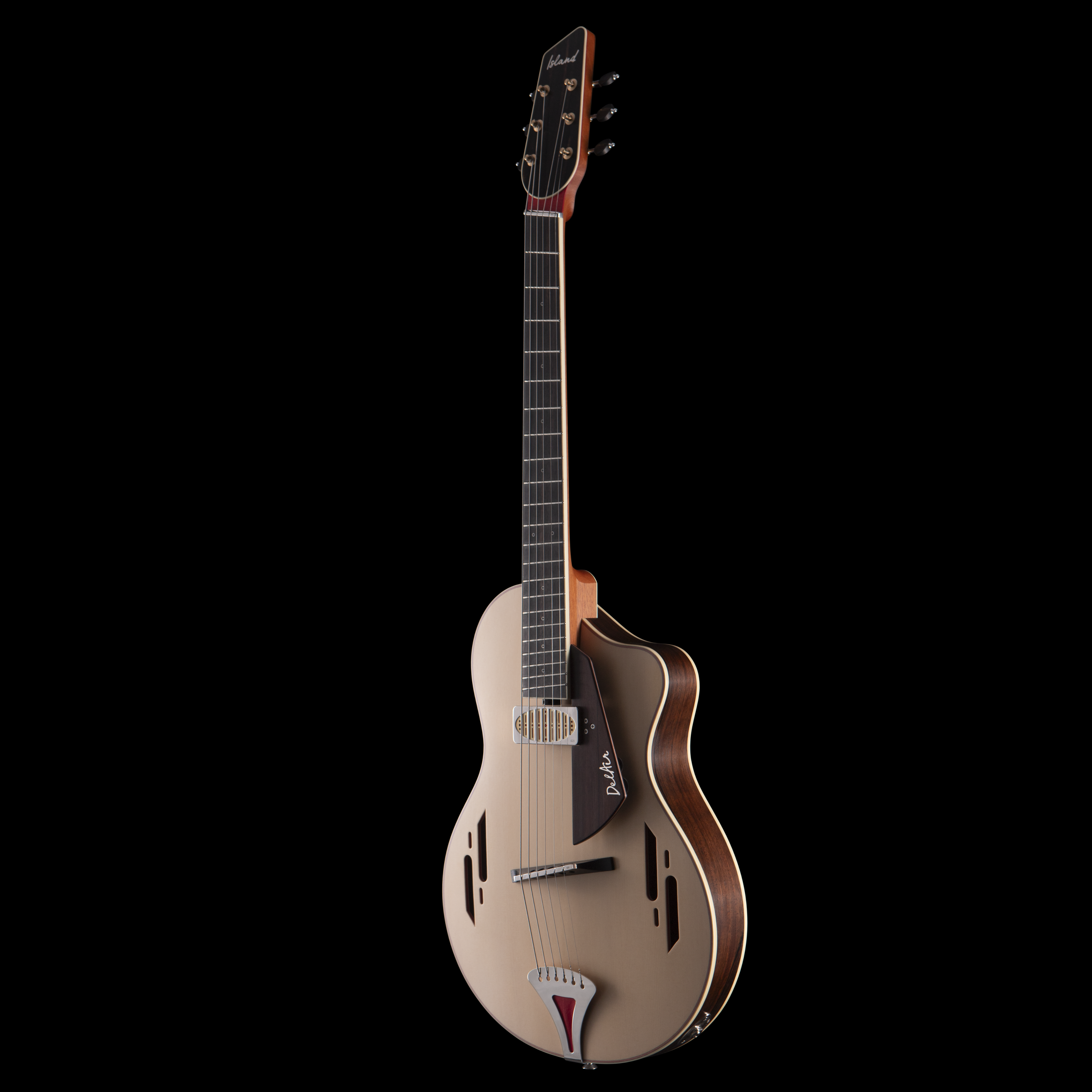 An Island Instrument acoustic guitar with a cutaway body design and a natural wood finish, standing upright against a black background.