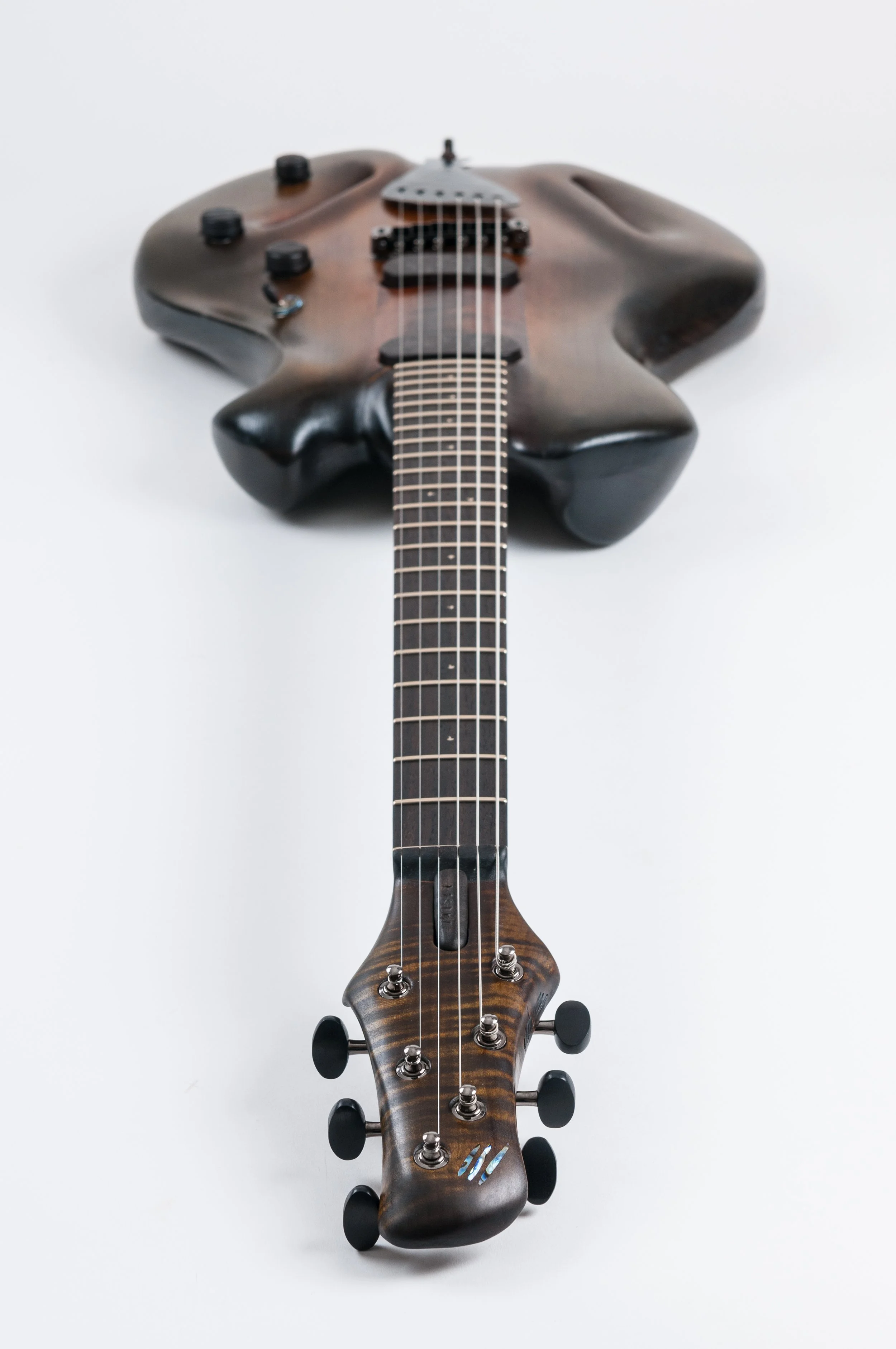 Close-up of the front of an Ergon Guitar shot from headstock down the body