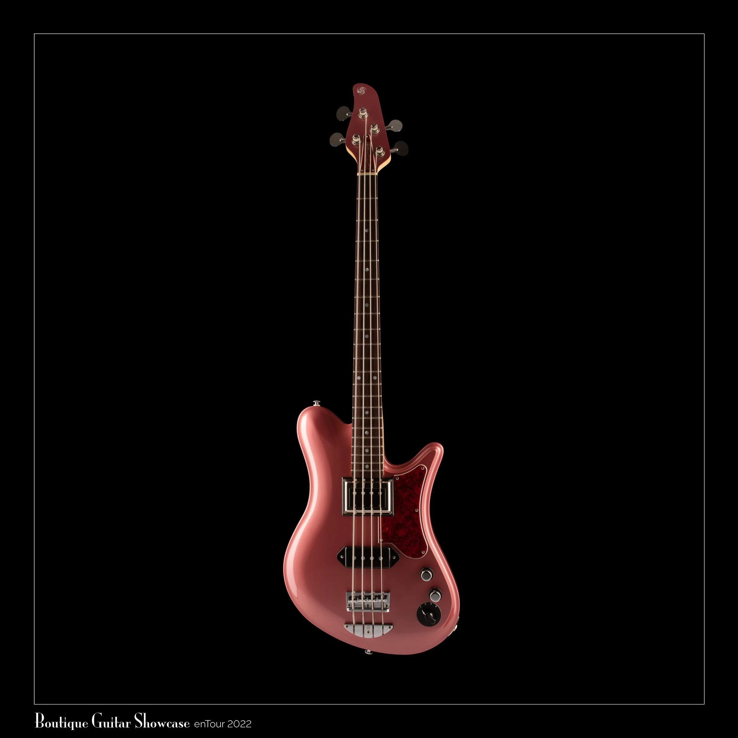 A pink electric OOPEGG bass guitar with a tortoiseshell pickguard, four strings, and control knobs against a black background.
