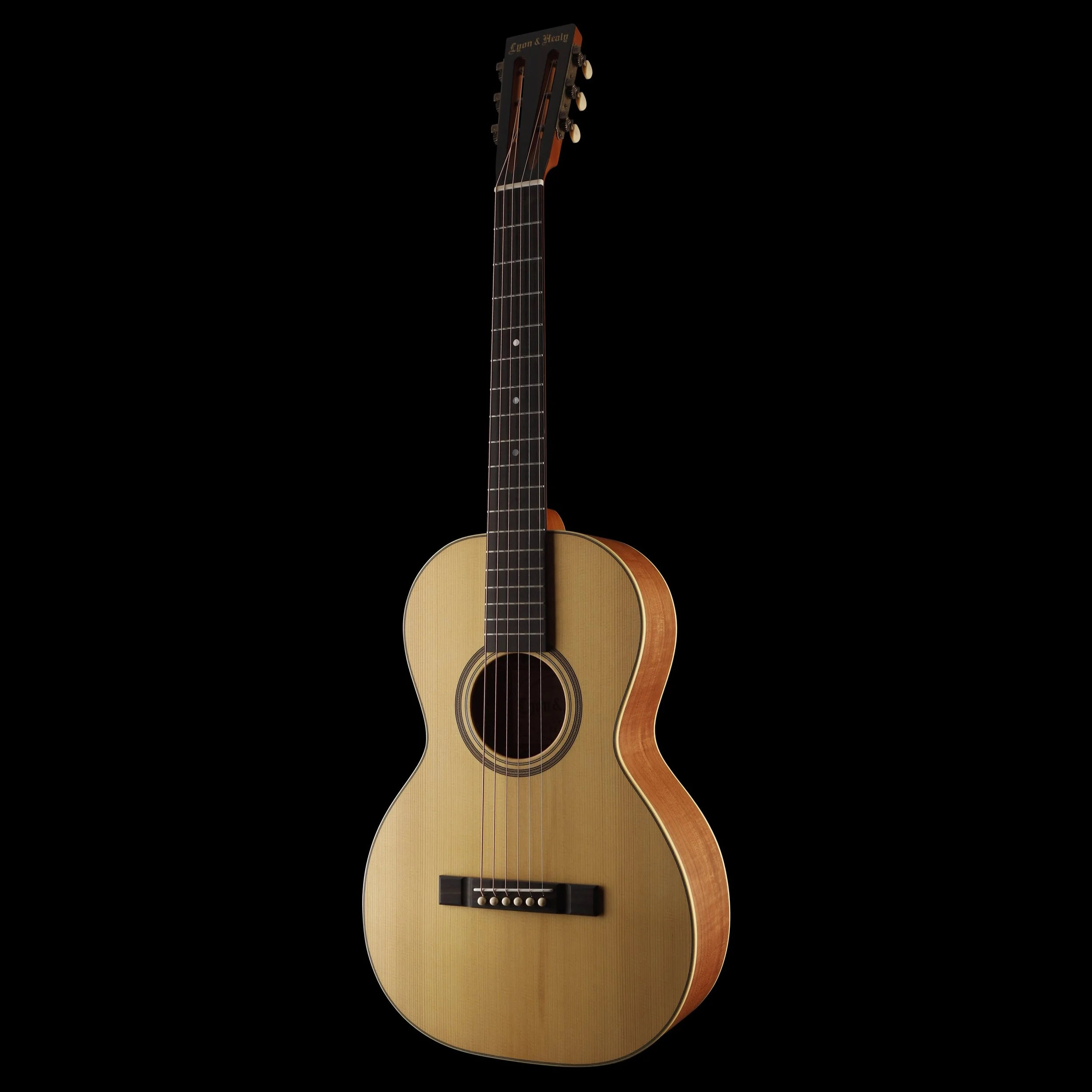 Acoustic Lyon & Healy guitar with light wood top and dark wood neck, set against a black background.