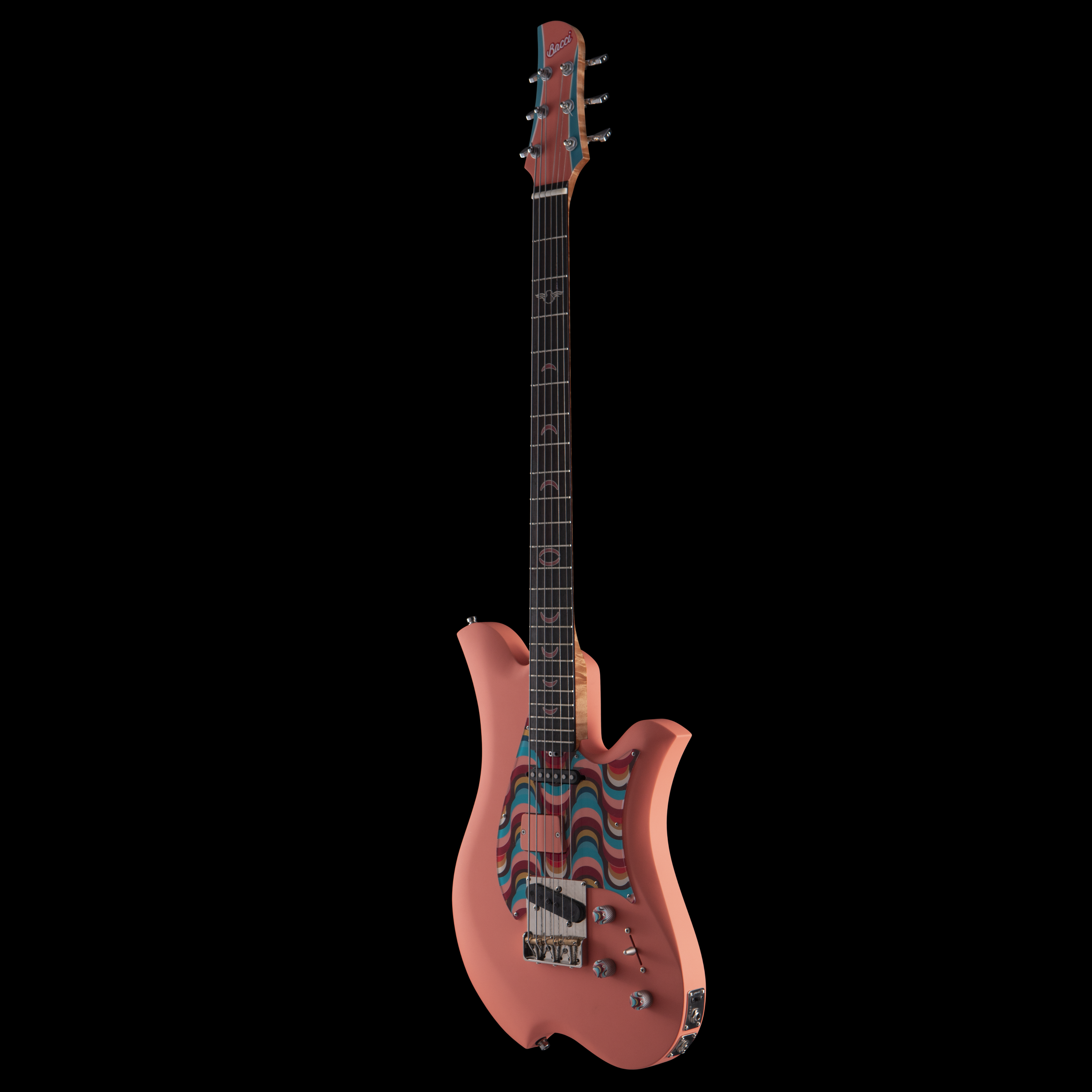 A pink electric Bacci guitar with a colorful abstract pattern on the body and headstock, set against a black background.