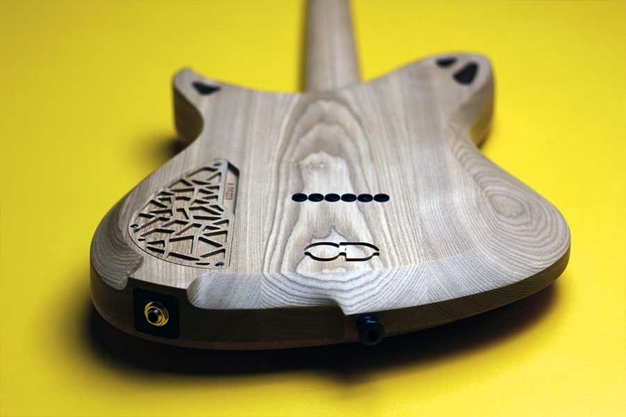 OD Guitars electric back of electric with geometric relief cuts.