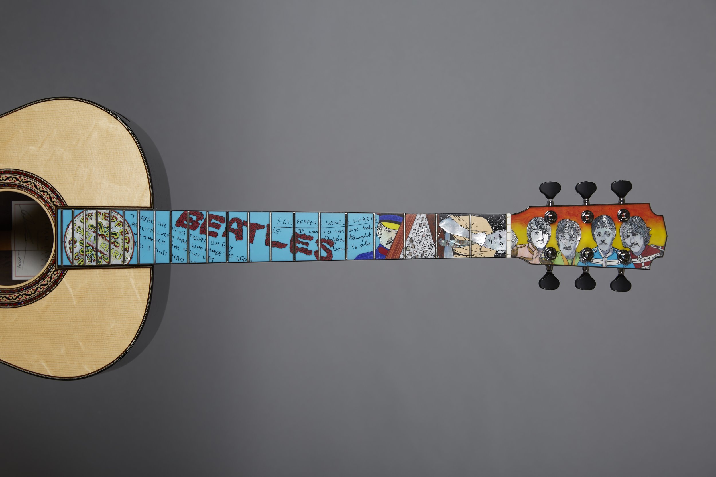 Grit Laskin Acoustic Guitar Sgt.Pepper.jpg