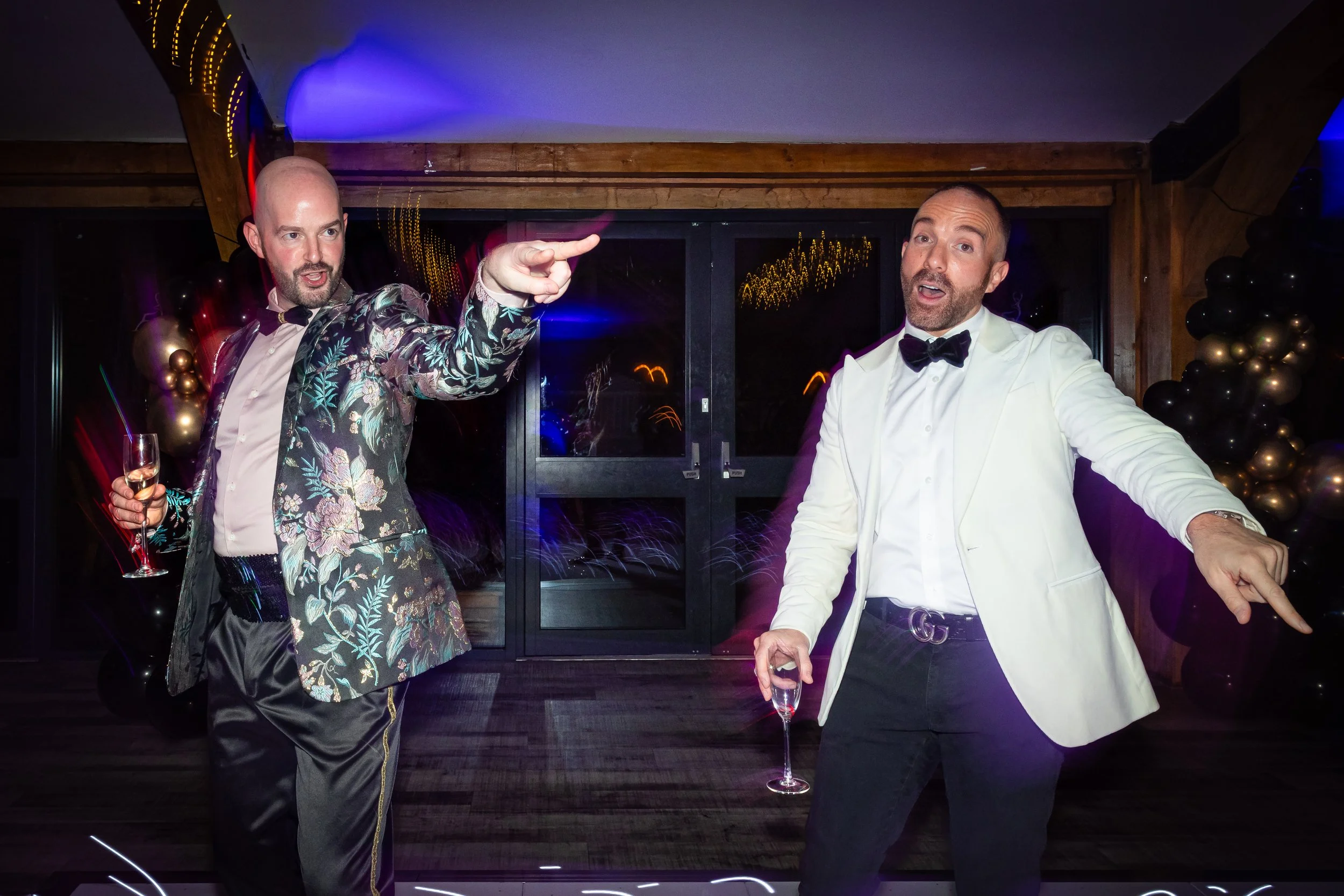 Fun candid photo of guests dancing at a lively birthday party in Cheshire.