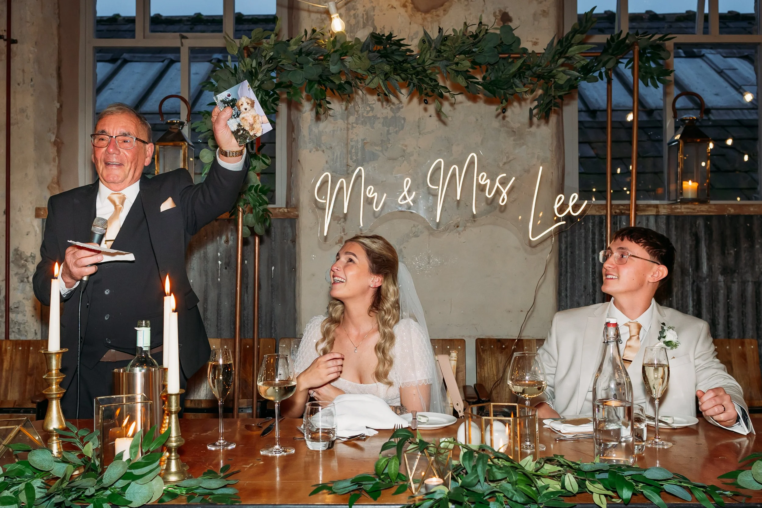 Emotional father of the bride speech at Holmes Mill wedding in Cheshire with bride and groom reacting