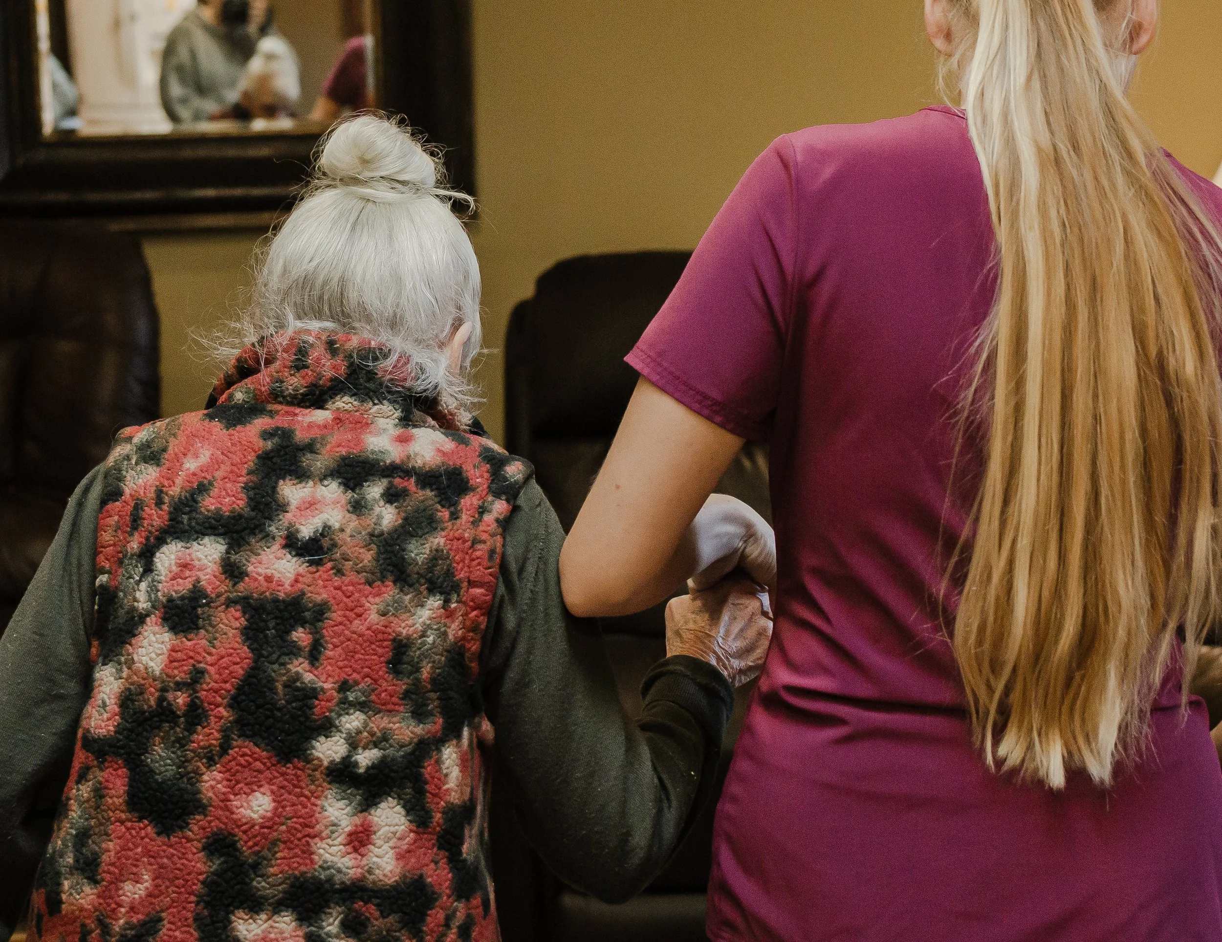 A Sherwood Resident and Caretaker inside Sherwood Adult Family Home by Belamour Care in Vancouver Washington