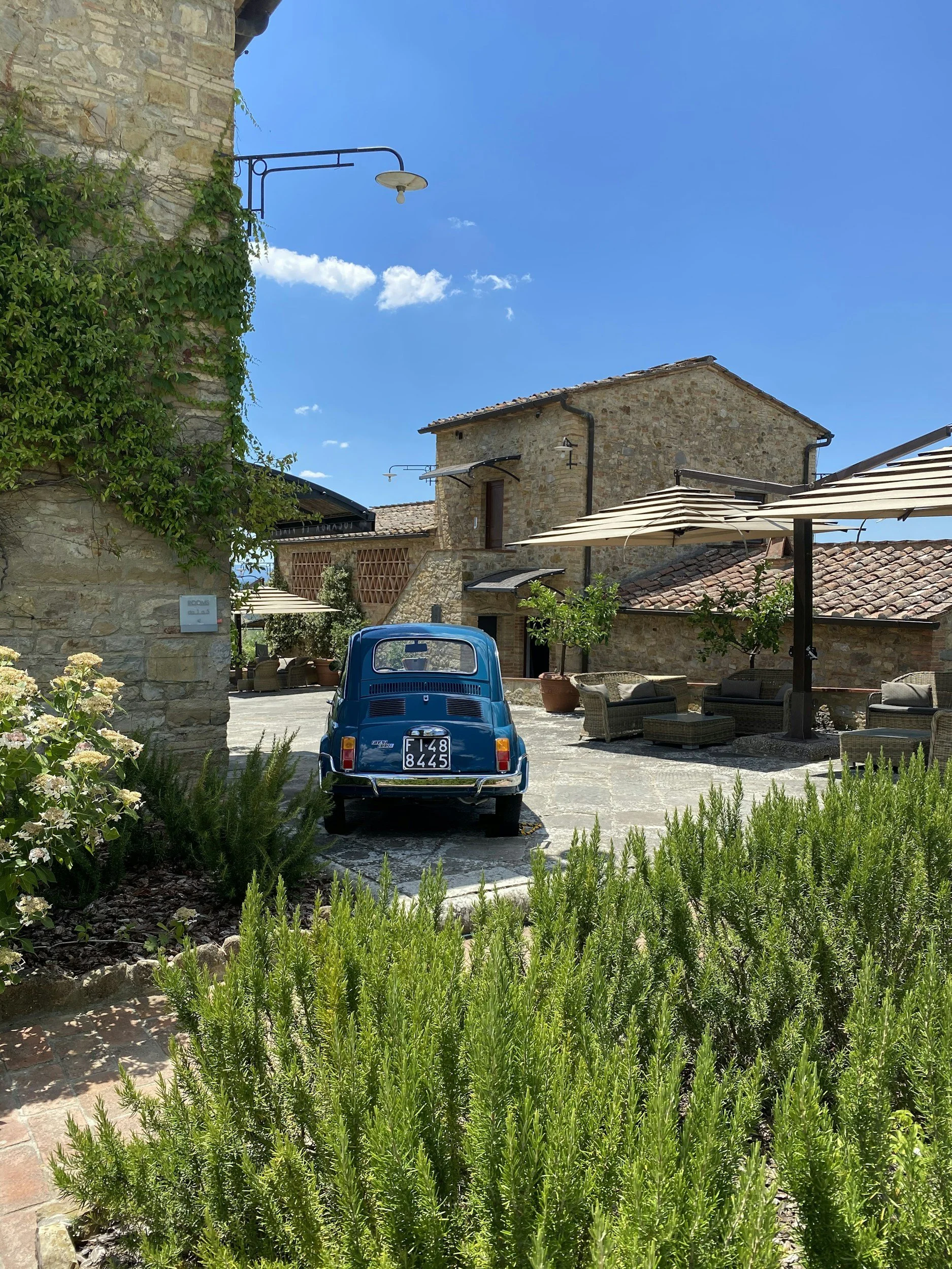 a beautiful home in Tuscan with a classic car