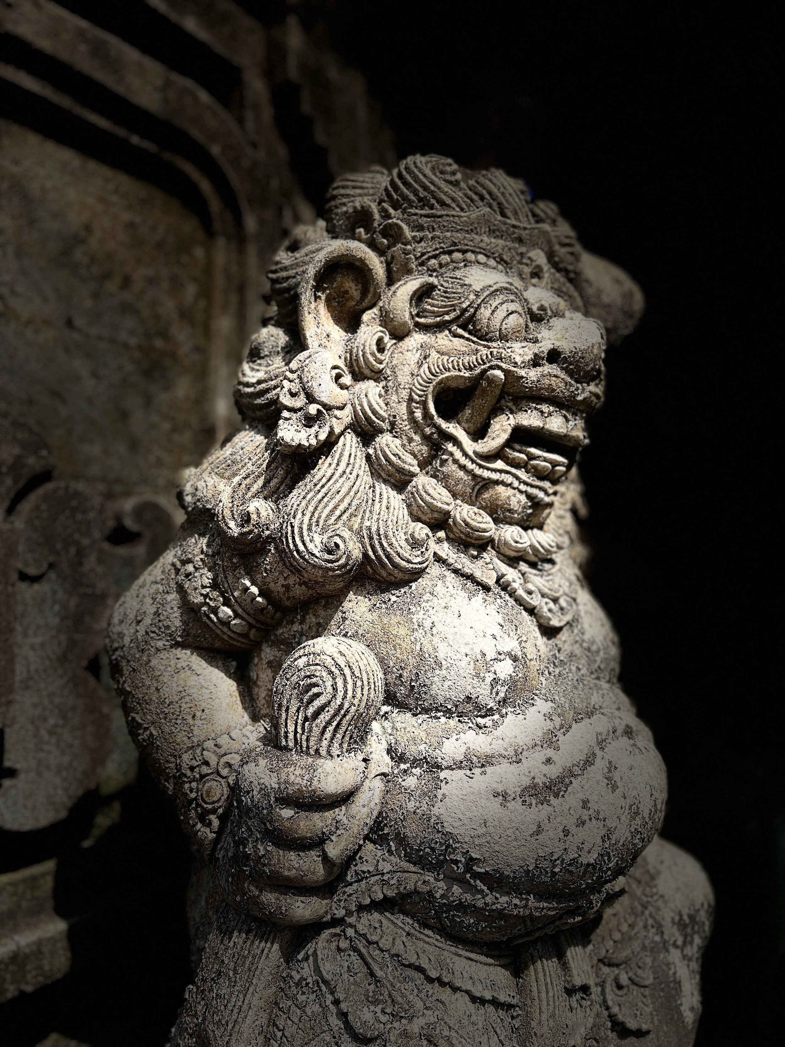 Bali statue guarding the area