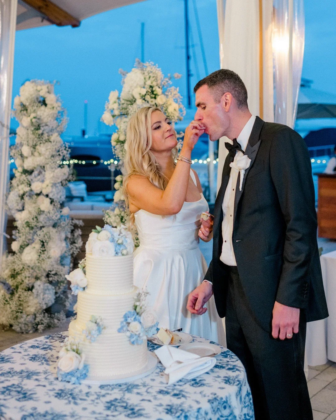A favorite detail from Caroline and Eddie&rsquo;s celebration at The Bohlin. Simple, beautiful, and shared. 💙 🤍 

📸: @jennifernicholephotography

#woodenpinbakingco #newportri #thebohlin #weddingcake