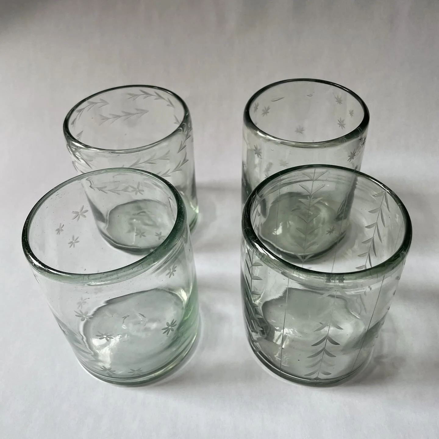 Limited Run Etched Recycled Glass 12oz Drinking Glasses.

 Set of 4 designs (Floral, Star, Horizontal, and Vertical Stripe)

 Measurements: 4&rdquo; H x 3&rdquo; D. 12 Fluid OZ. Durable and Dishwasher safe. 

You can check out our shop for direct pur