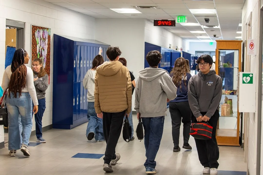 Union Colony Preparatory students walk through the hallway between classes.