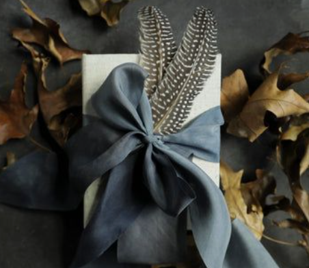 Signature luxury gift featuring artisanal wrapping and refined materials—designed to reflect personal brand values and intentional client relationships.