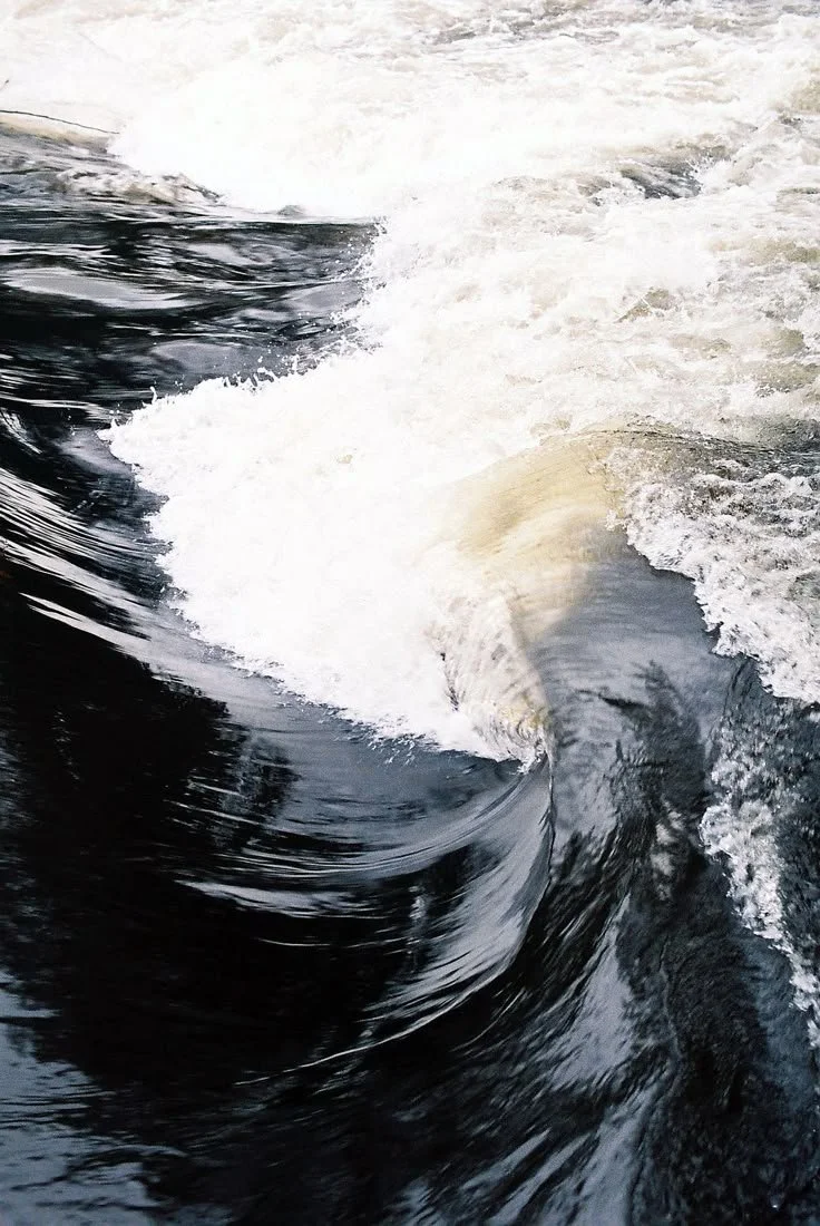 Abstract water and waves visual representing brand emergence and momentum—expressing clarity, transformation, and the moment where alignment becomes expansion.