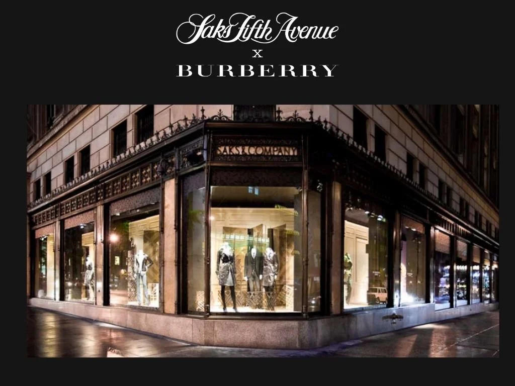 Full visual realization of Burberry at Saks Fifth Avenue, establishing brand authority through dedicated hard shops, flagship outposts, and a complete Fifth Avenue and corner-window takeover.