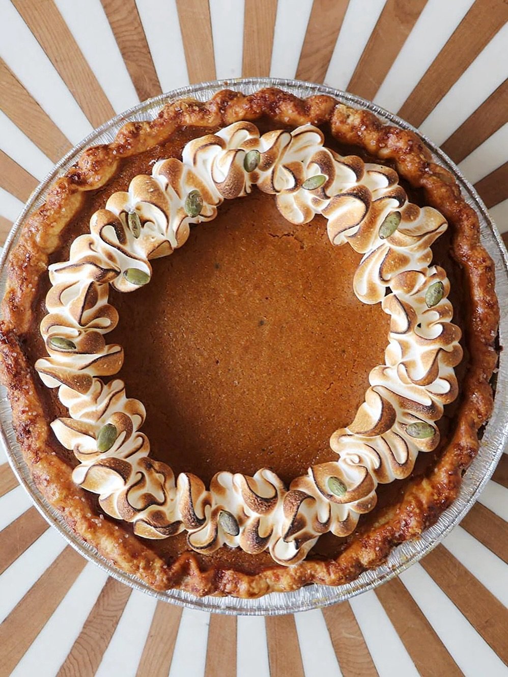 Make room on the Thanksgiving table for something extra special. 🥧✨

Our Brown Butter Pumpkin Pie takes a classic and gives it an elegant twist. Rich brown butter, silky pumpkin filling, white chocolate, and toasted pumpkin seeds.

Pre-order now thr