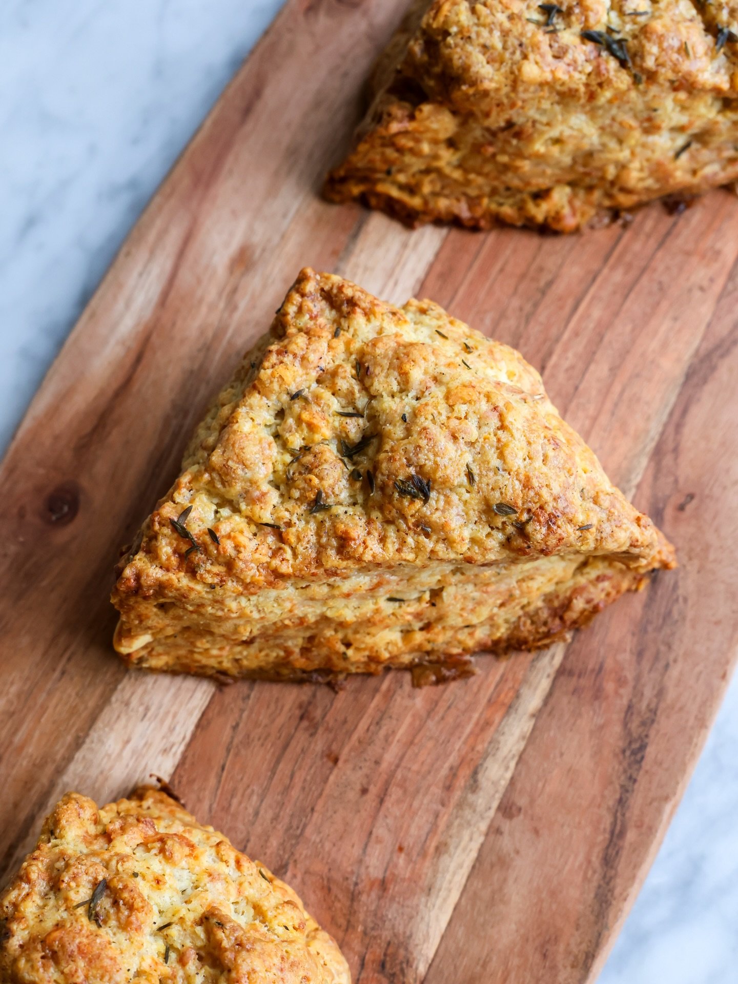 Flaky, buttery, and delicately savory. 🧀🌿 Gouda Thyme Scones, fresh out of the oven, are a perfect way to start a winter morning in NYC #thegoodbatch