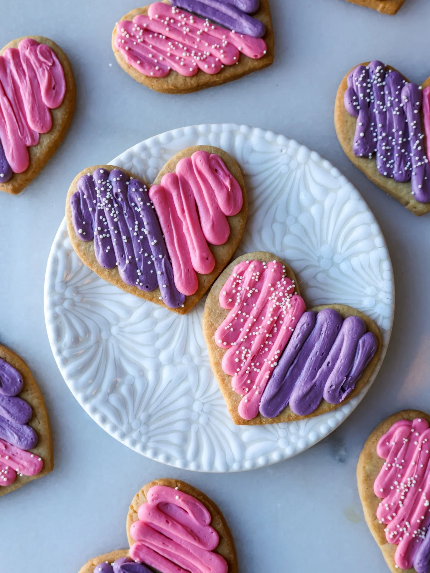 A sweet little love note, in cookie form. 💕

Brown butter shortbread topped with festive vanilla frosting, finished with nonpareils. Perfect for Valentine&rsquo;s, Galentine&rsquo;s, or any moment to spread love. #thegoodbatch