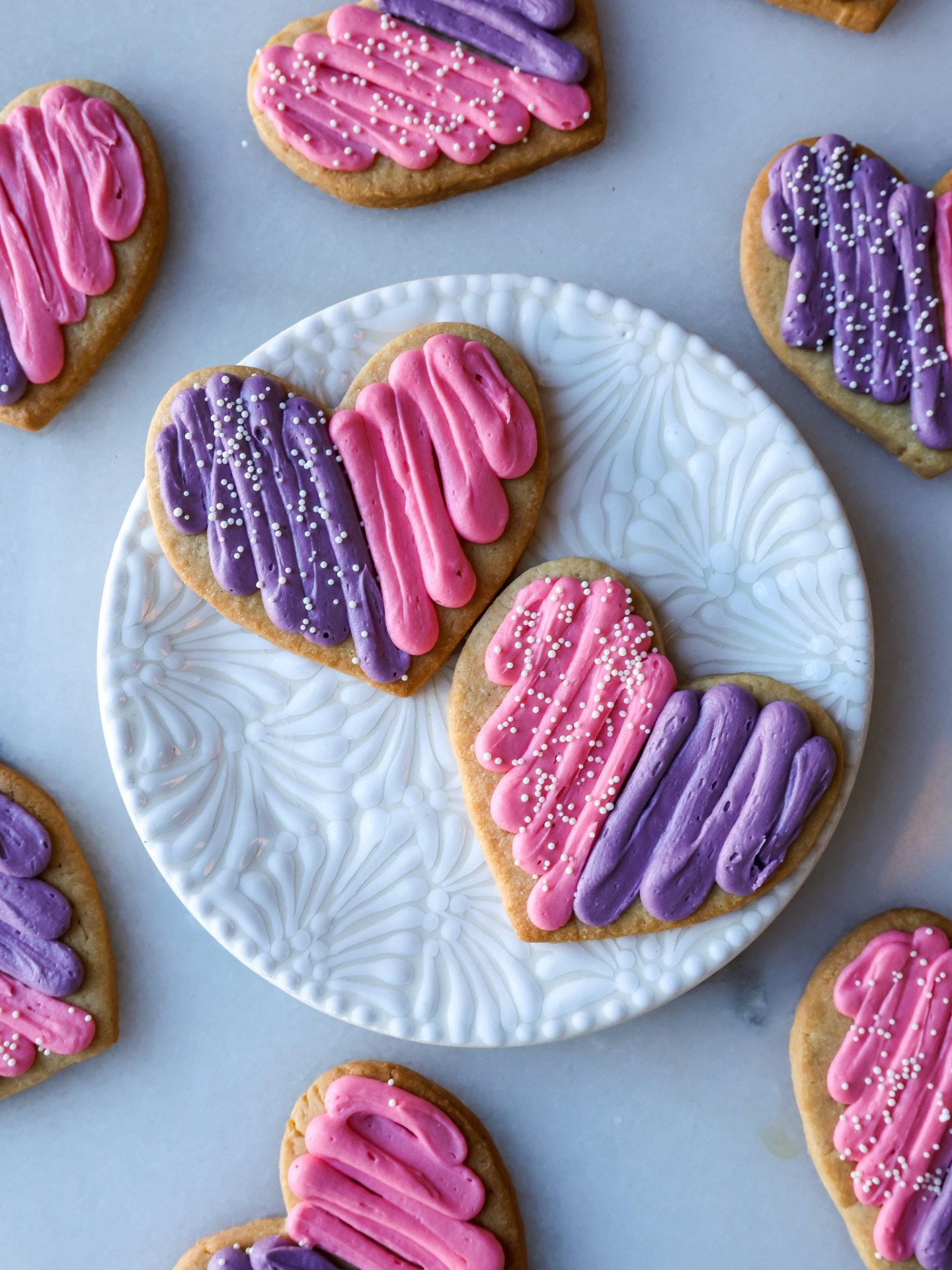 A sweet little love note, in cookie form. 💕

Brown butter shortbread topped with festive vanilla frosting, finished with nonpareils. Perfect for Valentine&rsquo;s, Galentine&rsquo;s, or any moment to spread love. #thegoodbatch