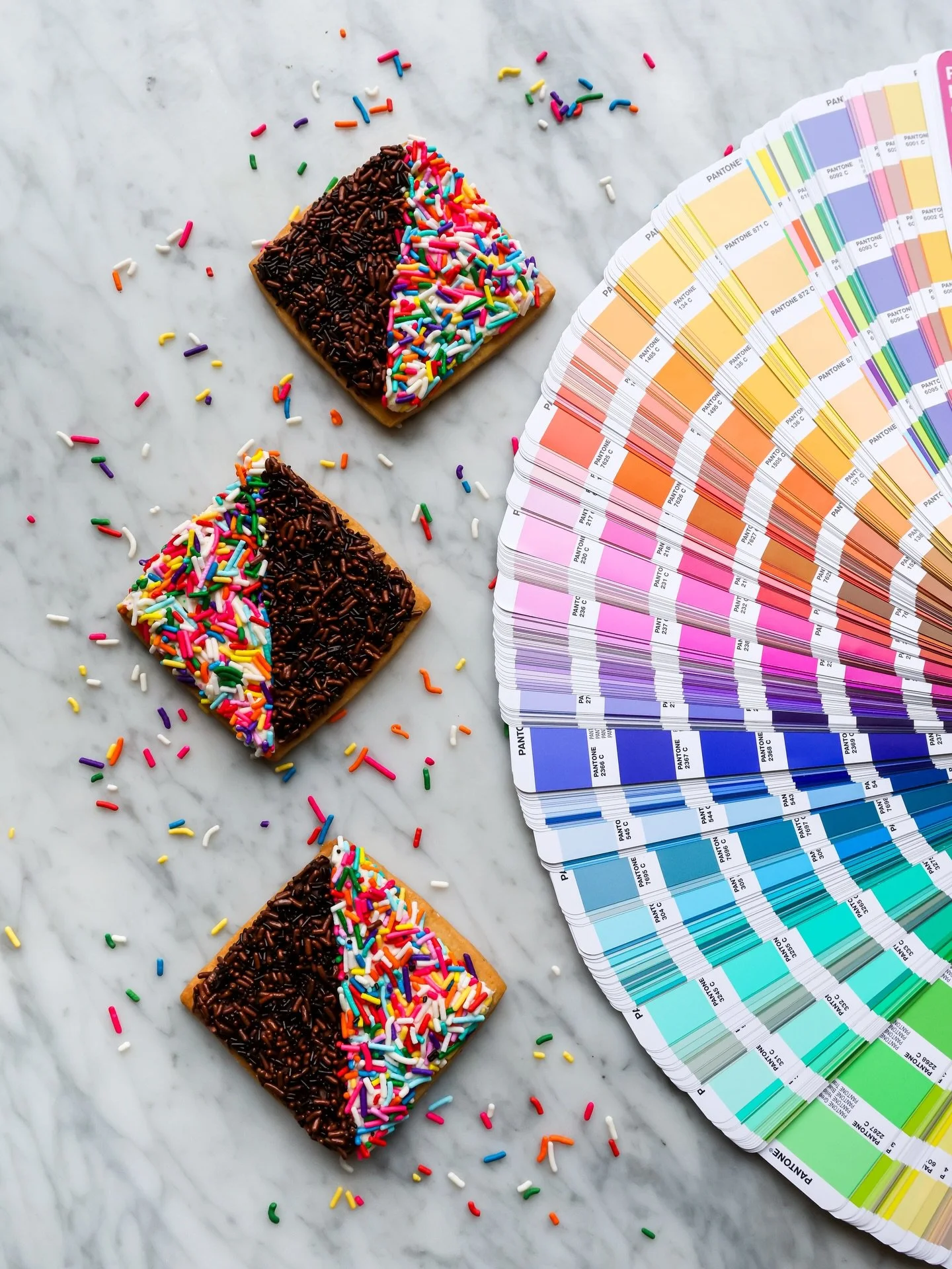 A classic, in technicolor. 🌈🖤🤍

Our Technicolor Black + White cookie starts with a crisp brown butter shortbread base, topped with chocolate and vanilla frostings and finished with alternating rainbow and chocolate sprinkle medleys. Available dail