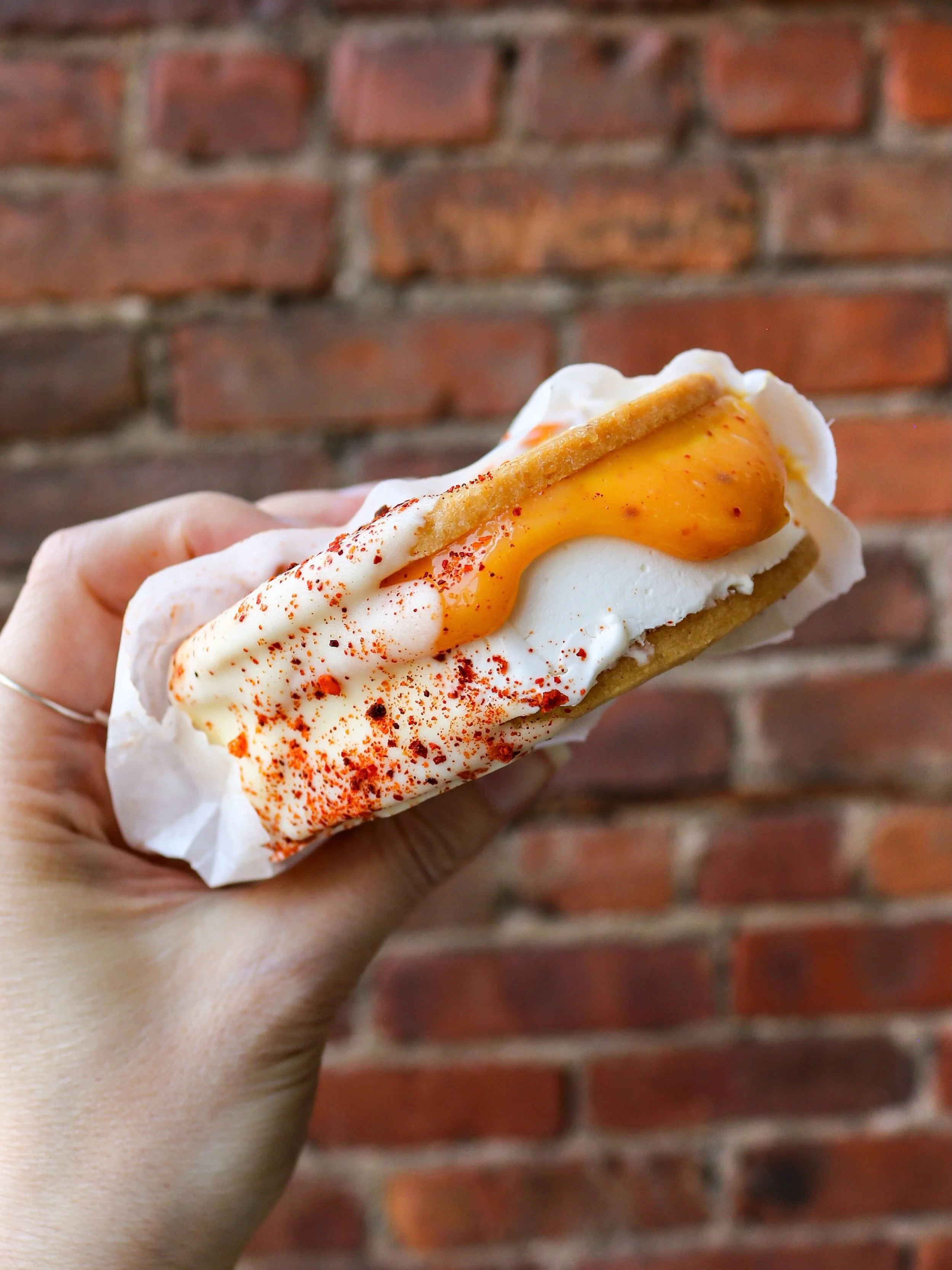 Brighten up your week with our Spicy Margarita Ice Cream Sandwich: mezcal-passionfruit curd, brown butter cookies, vanilla ice cream, and a white chocolate + chili finish. 🌶️🍦 #thegoodbatch #spicymargs
