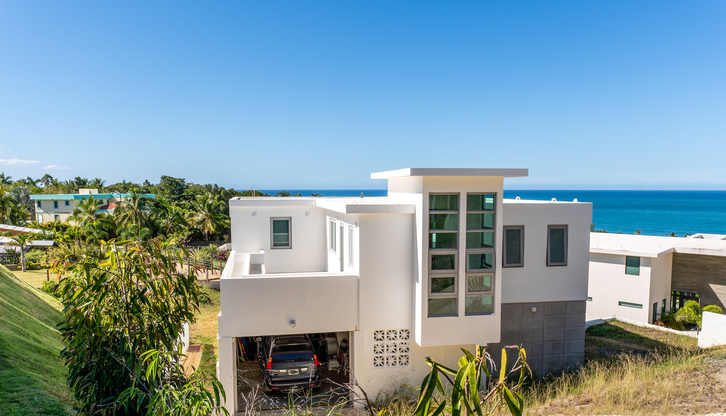exterior facade of top of the hill casa in puntas rincon pr by vampio design inc.jpg