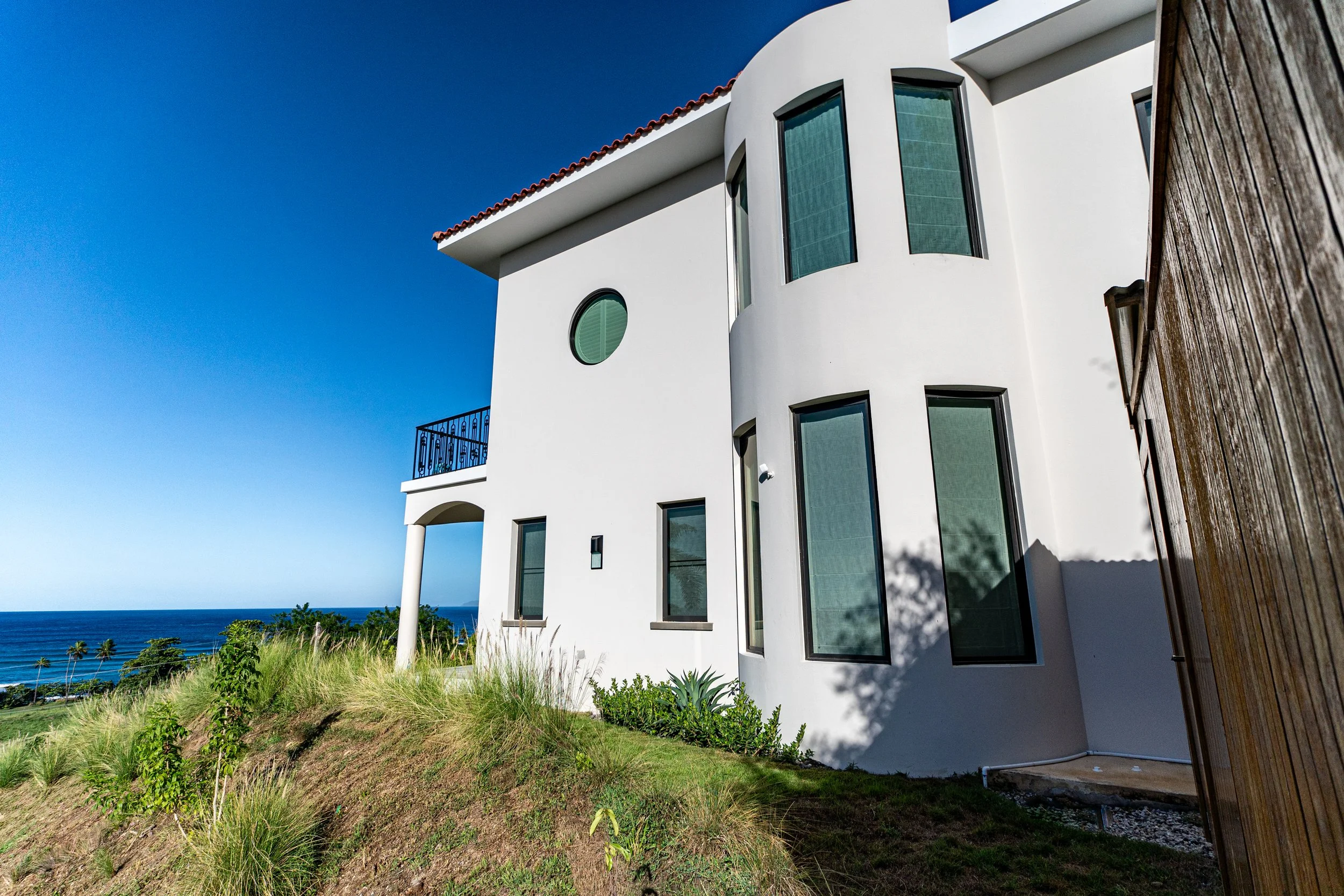 exterior side profile of road 413 mediterranean house designed by top architect vampio design inc.jpg