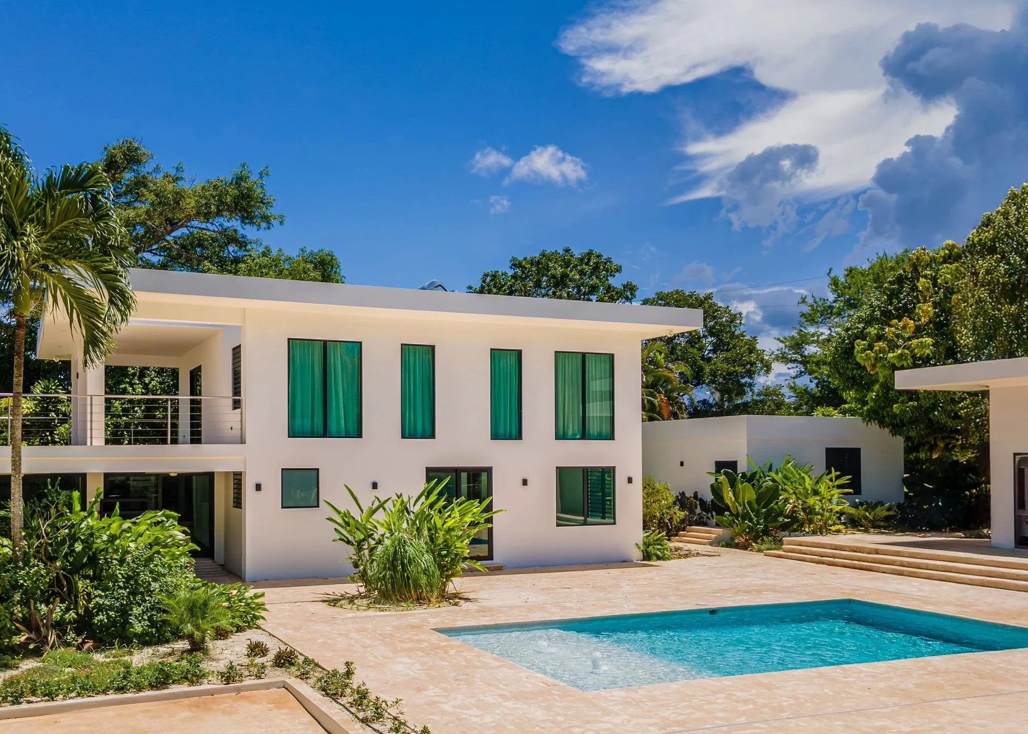 A coastal residential project designed to embrace ocean breezes, natural ventilation, and contemporary Caribbean living. The home incorporates durable materials, open floor plans, and expansive outdoor living areas.