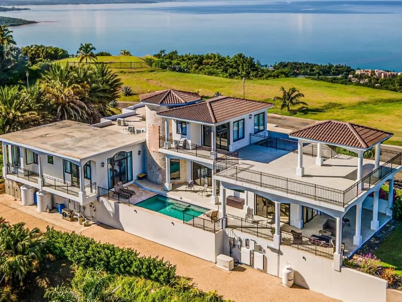 A luxury Mediterranean-inspired custom residence in Rincón, Puerto Rico, designed to maximize ocean views, natural light, and seamless indoor-outdoor living. This custom home combines timeless architectural elements with modern coastal design.