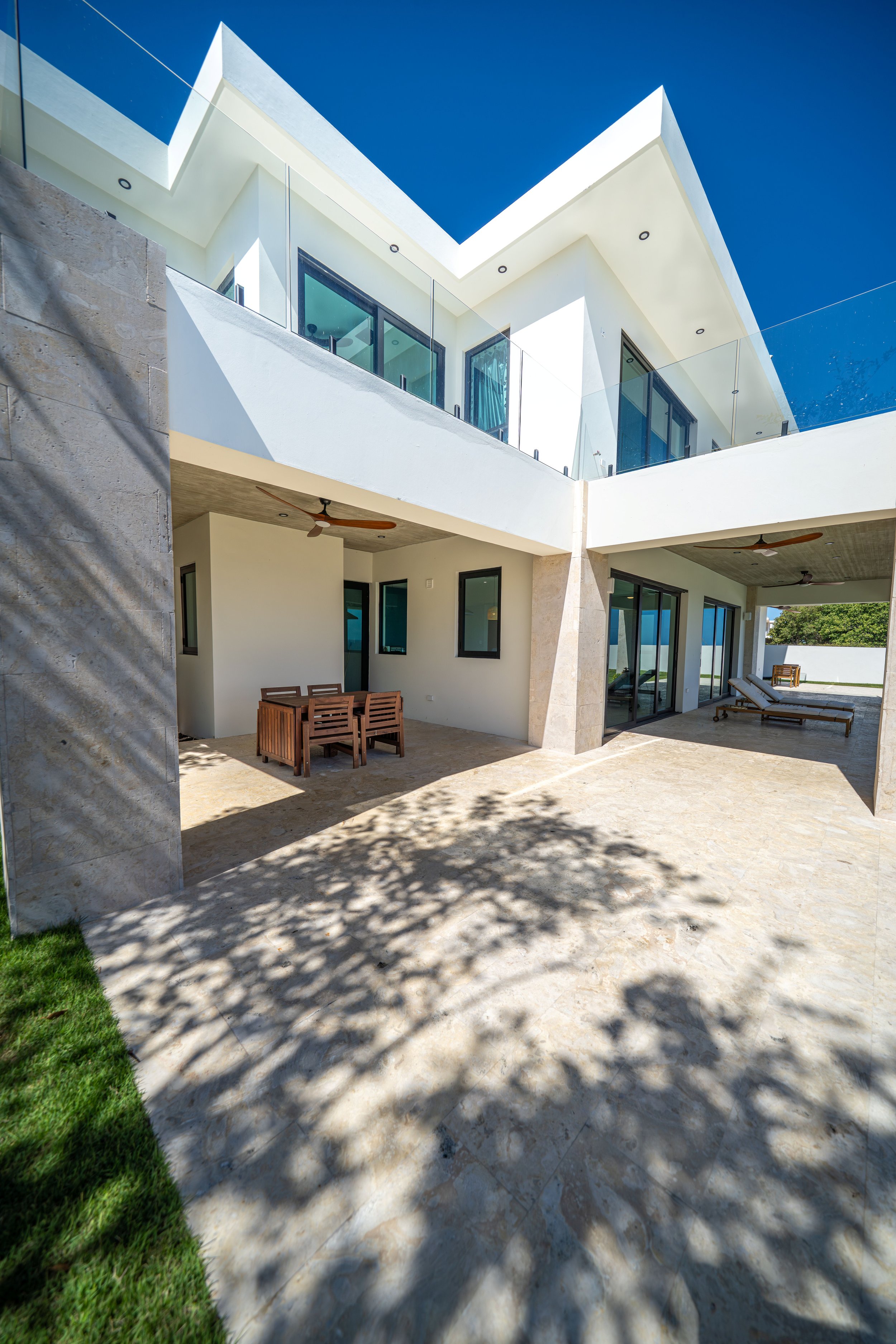 exterior detail shot of the concrete and clean lines architectural details designed by vampio design inc.jpg