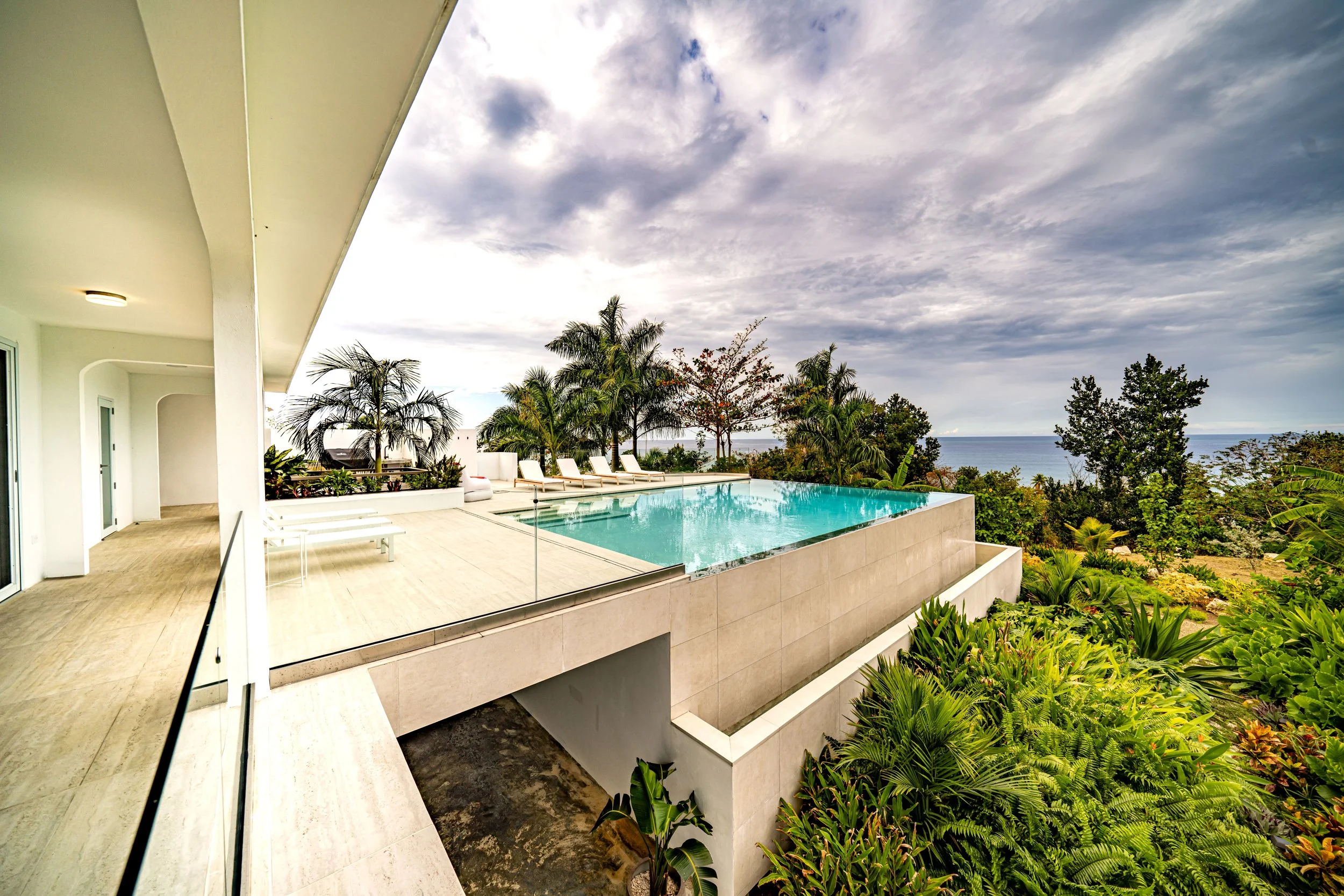 custom bridge to infinity pool custom design by vampio design inc in puerto rico.jpg