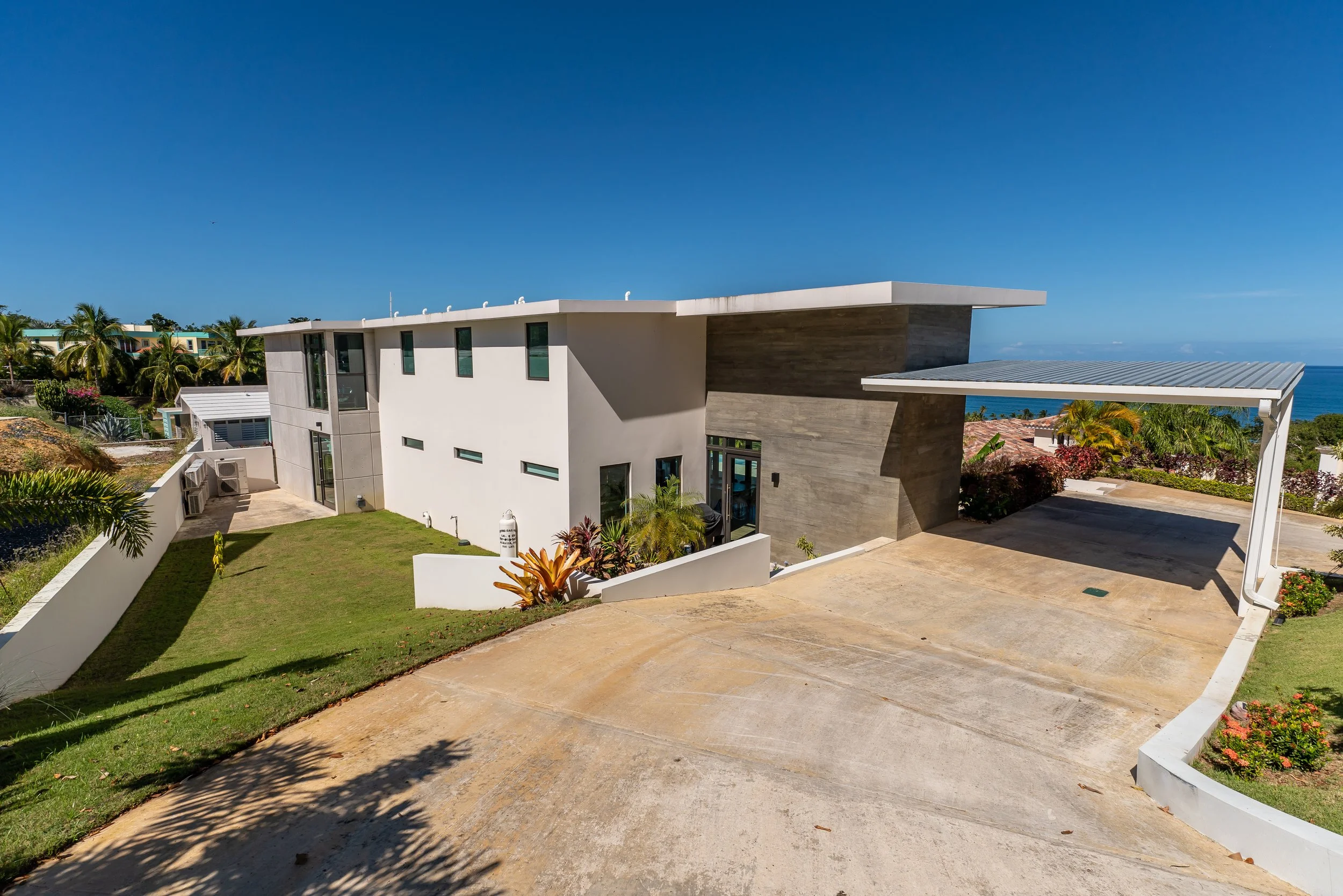 exterior facade of bottom of the hill casa in puntas,rincon, by top architect in rincon, pr.jpg