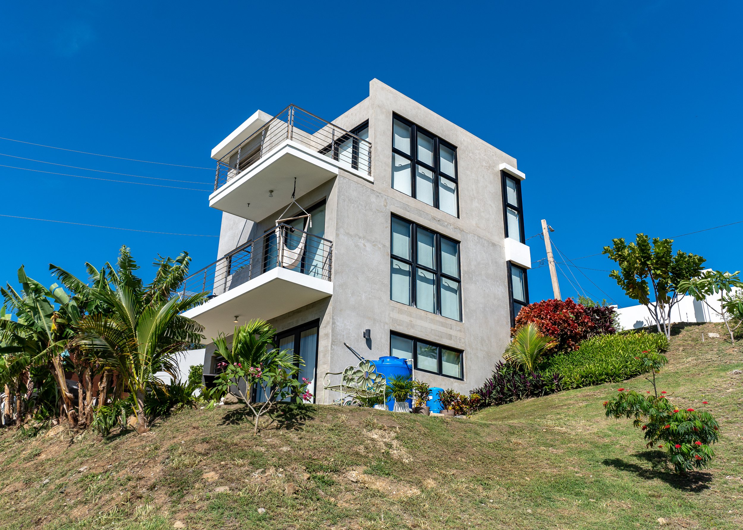 exterior low vantage point of exterior outside of la casita in rincon, pr designed by vampio design inc top architect in rincon, pr.jpg