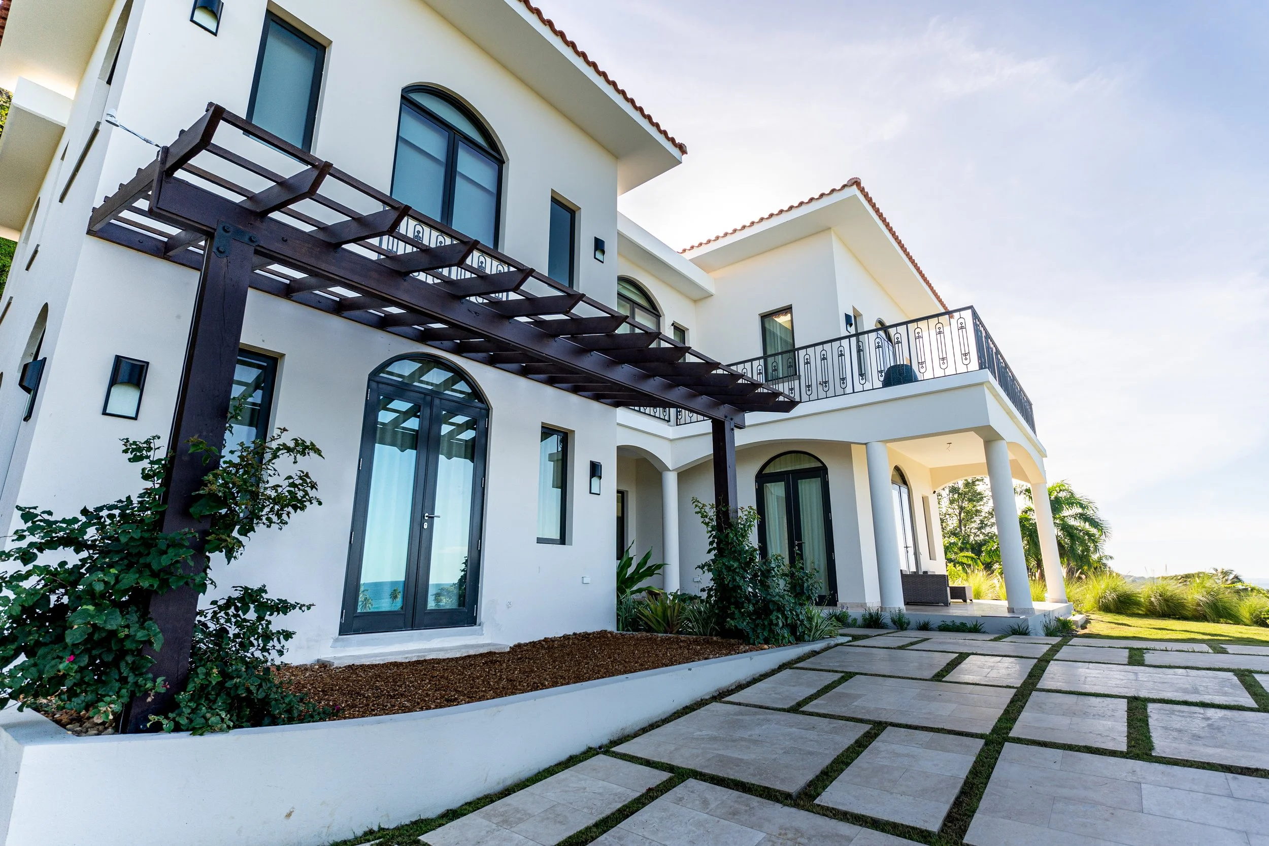 exterior details of road 413 mediterranean house design by top architect in rincon, pr.jpg