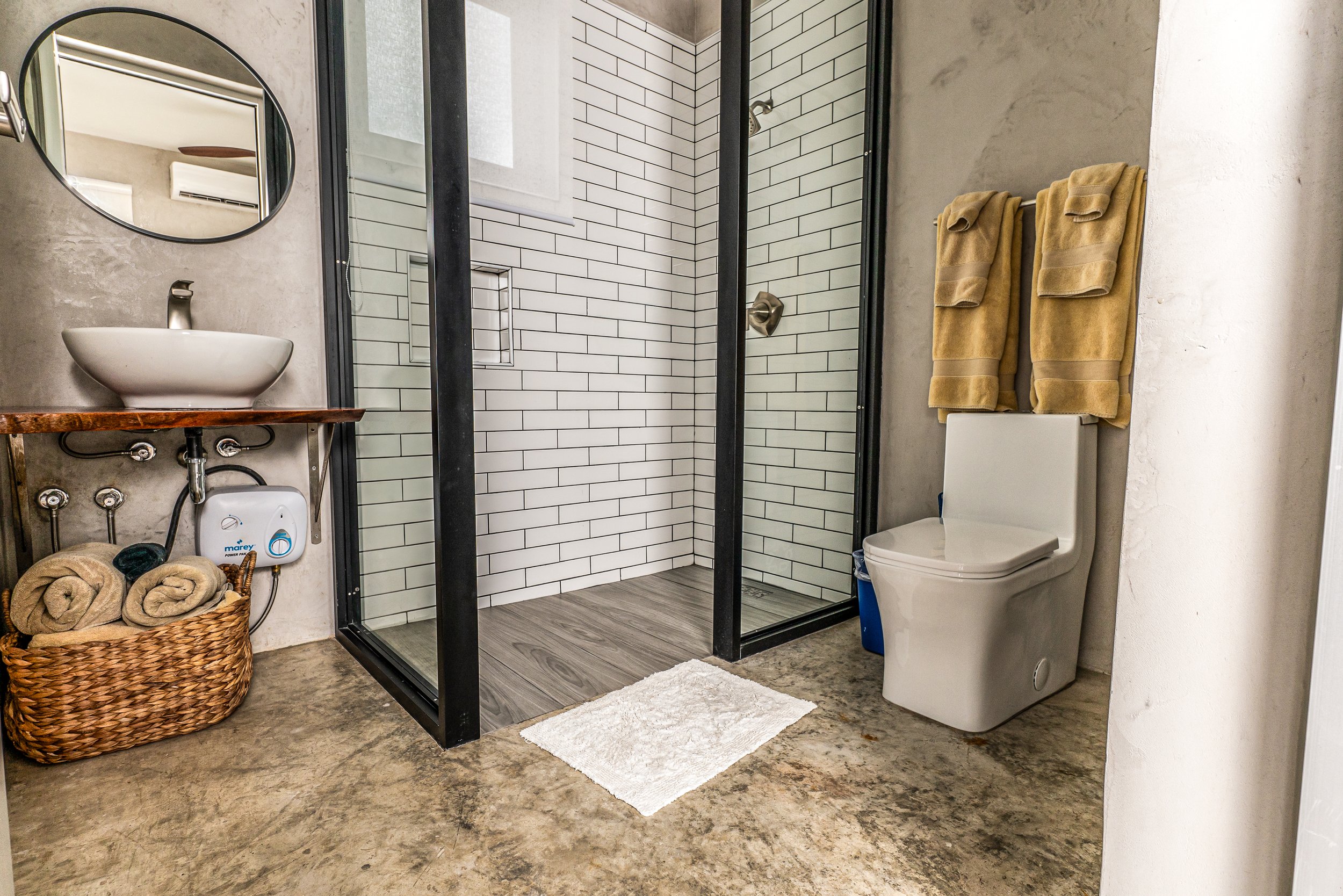 Master Bedroom bathroom on suite in la caista in rincon, pr designed by top architect vampio design inc.jpg