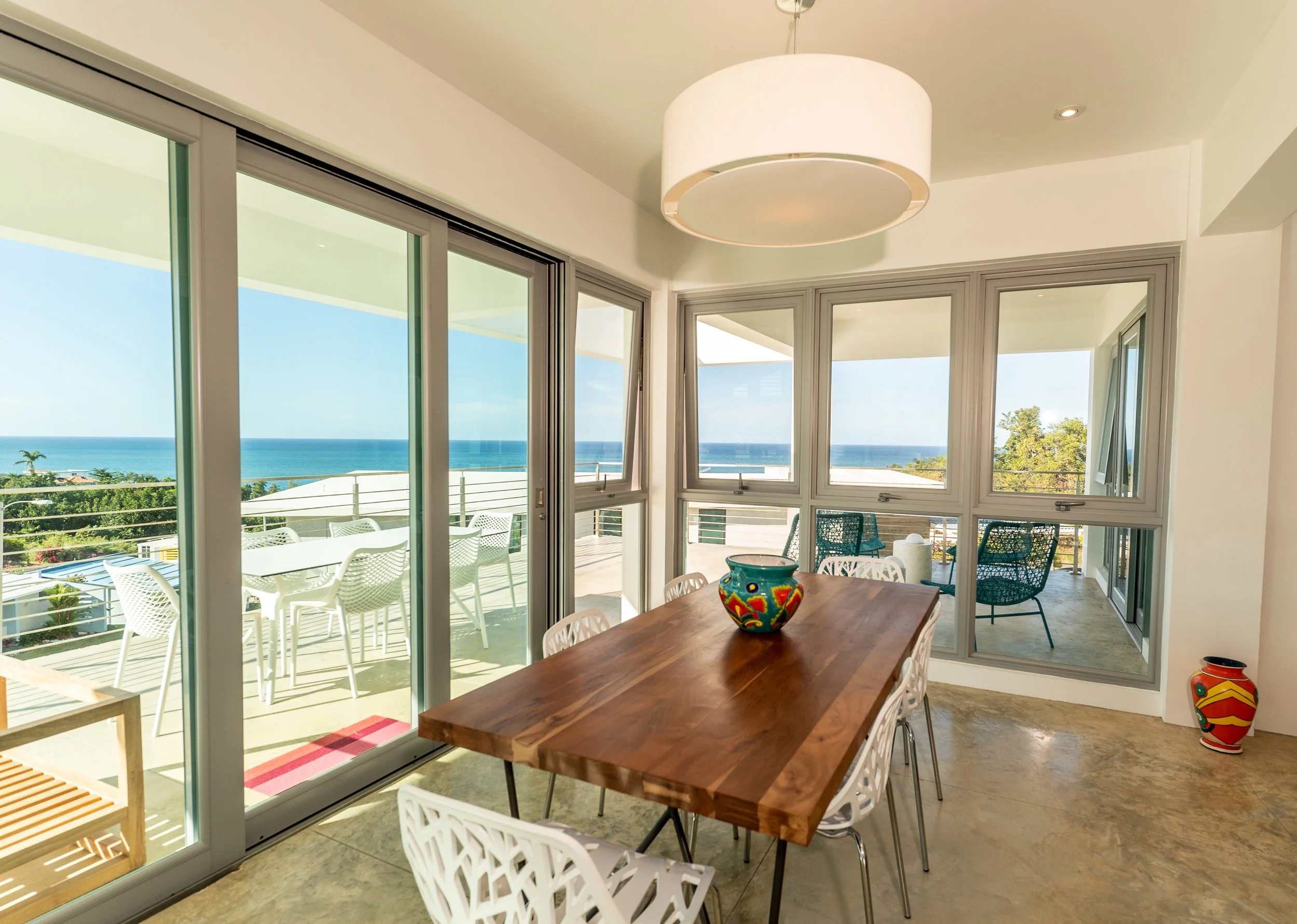 dining room cena in three little birds puntas rincon, pr dsigned by top architect vampio design inc.jpg