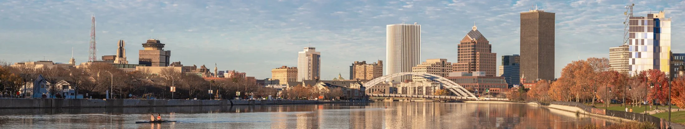 Panoramic view of downtown Rochester, New York, across the Genesee River in autumn.