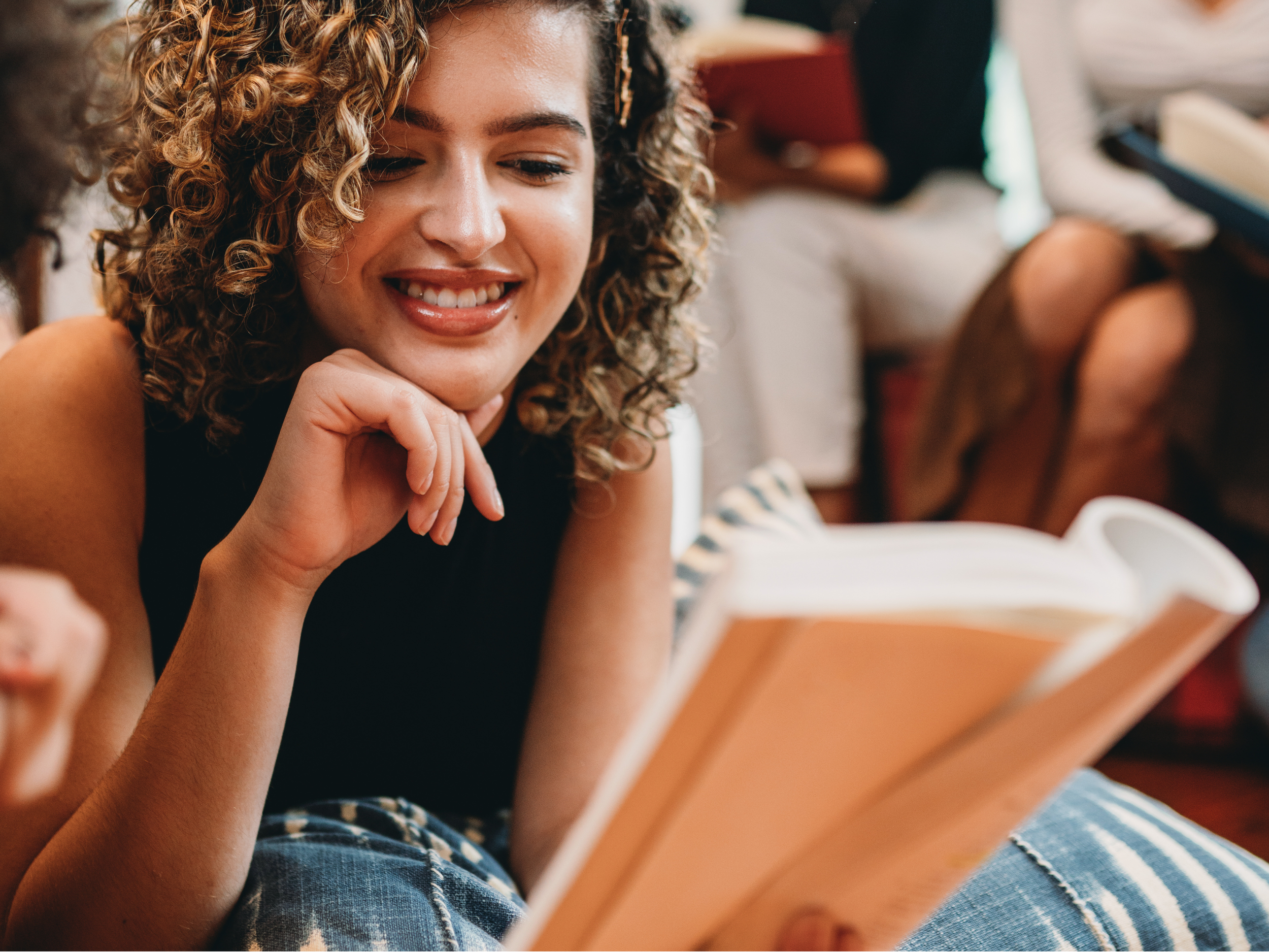closeup of black woman reading a book