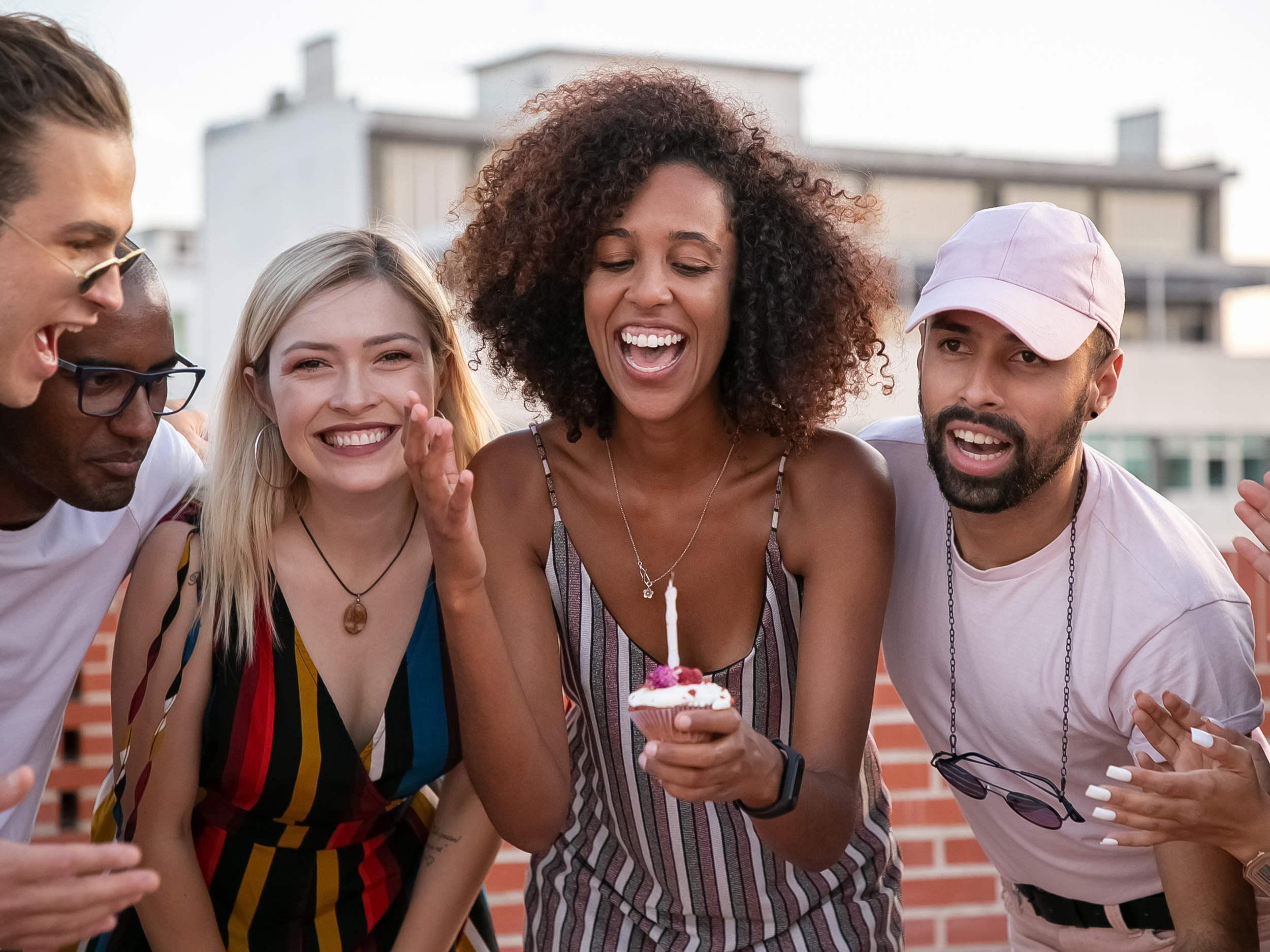 black woman celebrating with friends