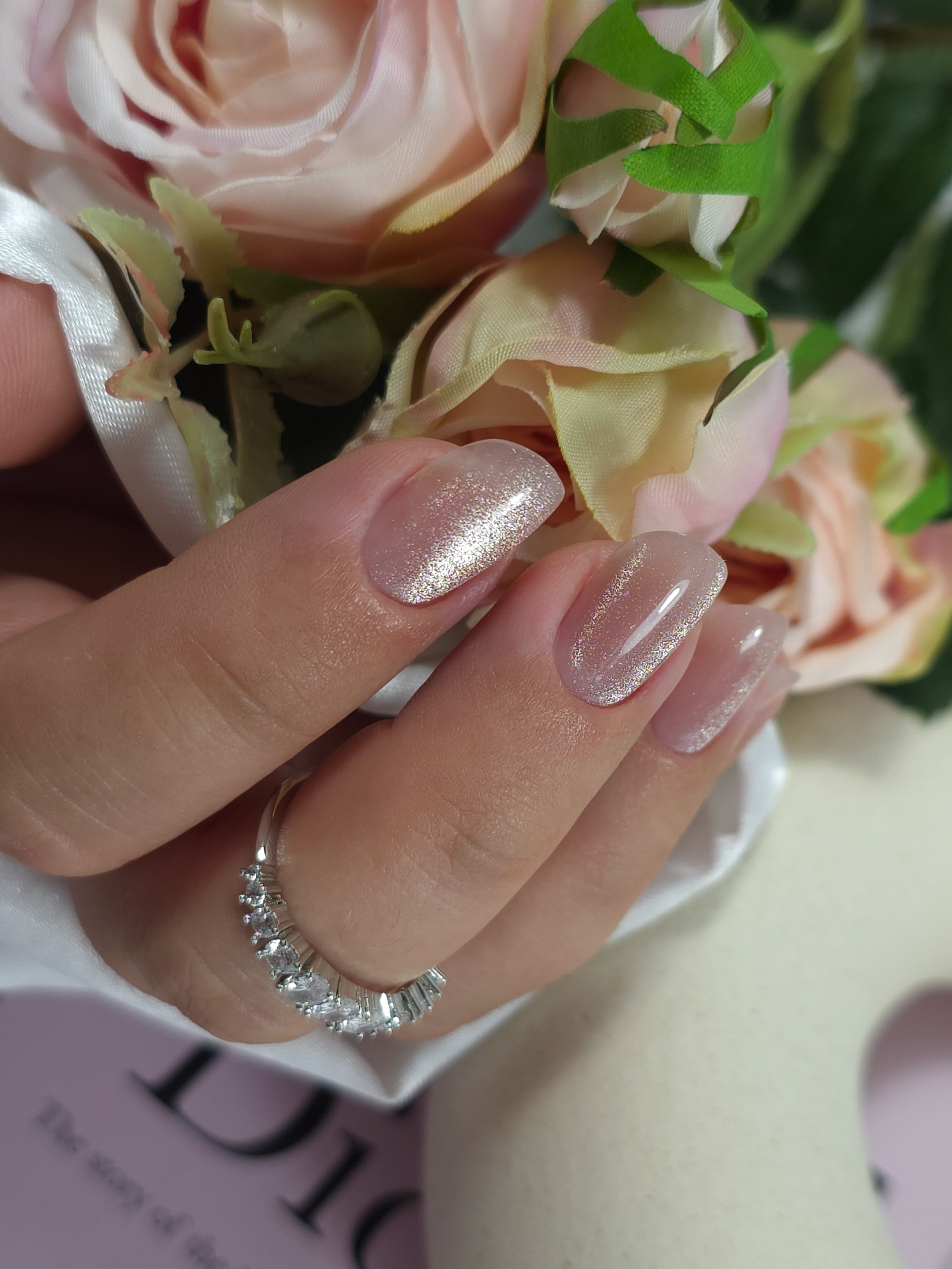 4. Client's nails now after one year of treatments, and no longer trapezoidal!