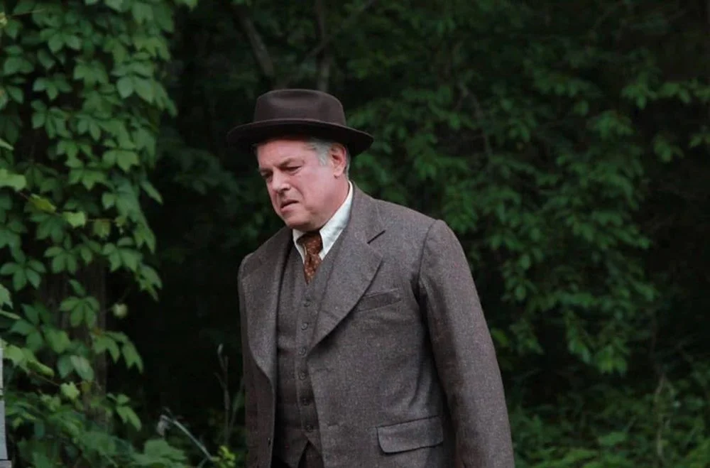  Brian Mani as Willy Loman walking down the street