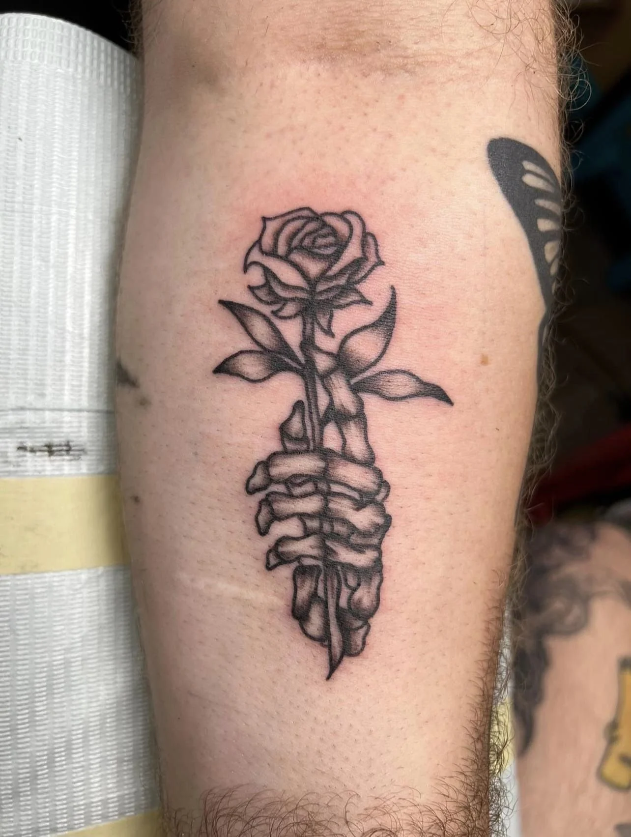 flower skeleton hand tattoo