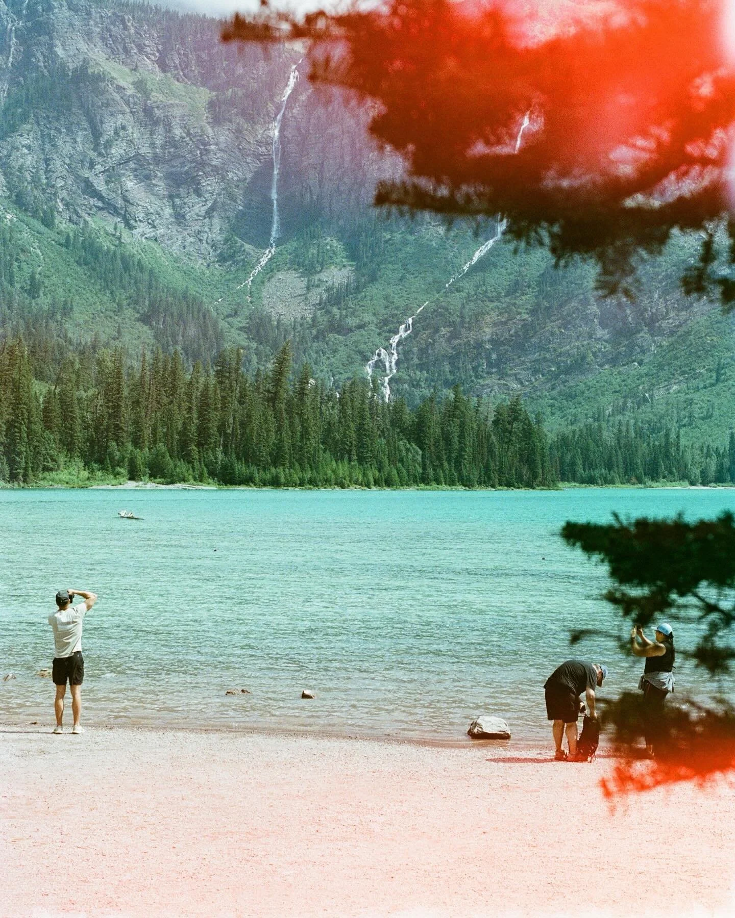 The only reason I&rsquo;m not upset about the light leaks is because I had zero expectations of these coming out at all ❤️&zwj;🔥

#glaciernationalpark #montana #avalanchelake #portra400 #nikonfe2 #travelfilm