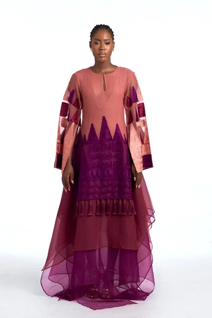 Runway look by Ejiro Amos Tafiri featuring elegant Afrocentric tailoring, showcasing the Lagos designer’s signature blend of culture and sophistication