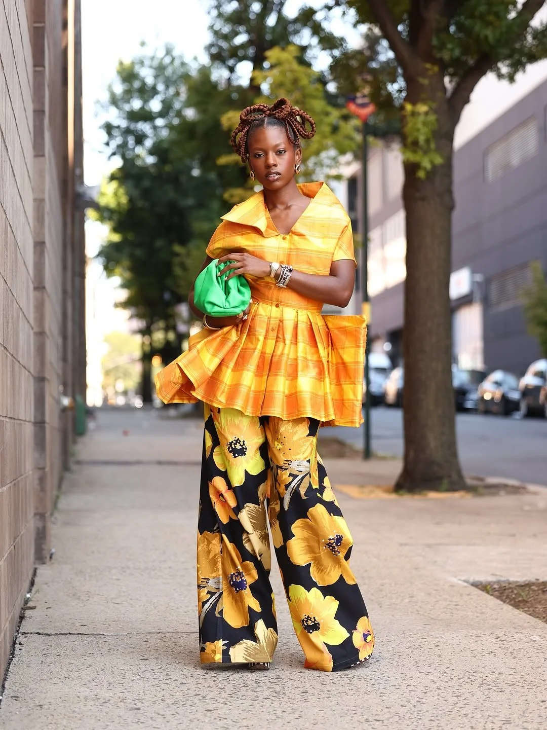 @amiraavainqueur in a Christopher John Rogers ensemble