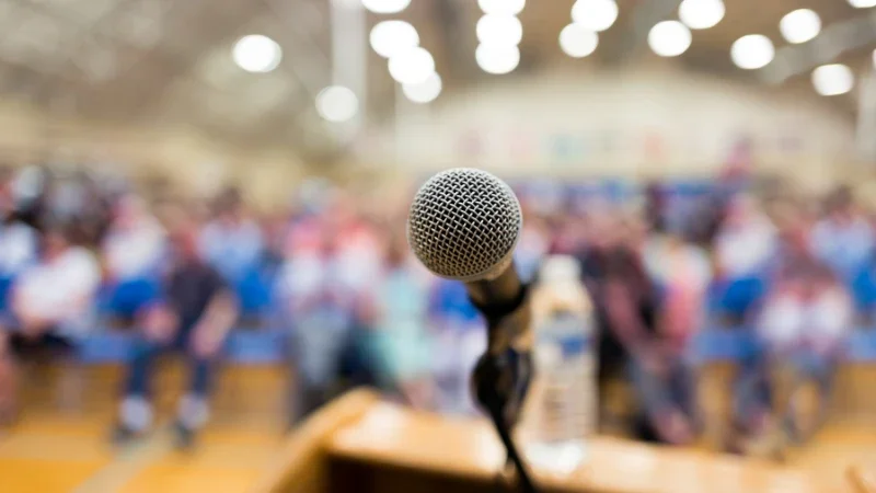 Community category: microphone at lectern