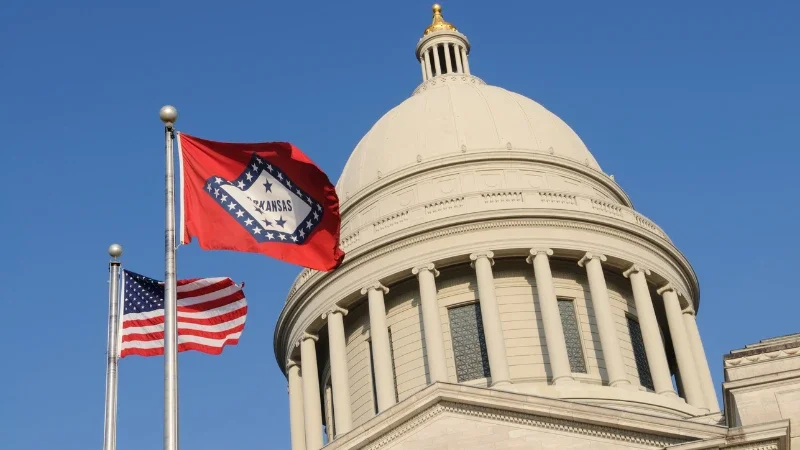 Policy category: Arkansas capitol dome with flags