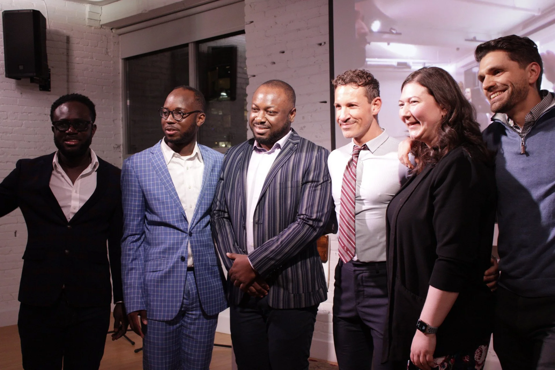 A picture of board of directors and founders of Alive House at the launch event from the side