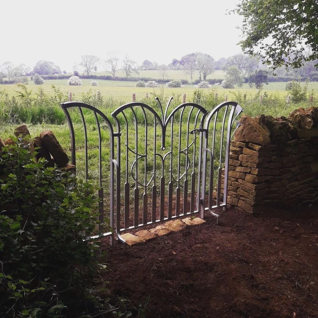 Finished hand-forged steel entrance gate installed at Rough Bank Nature Reserve